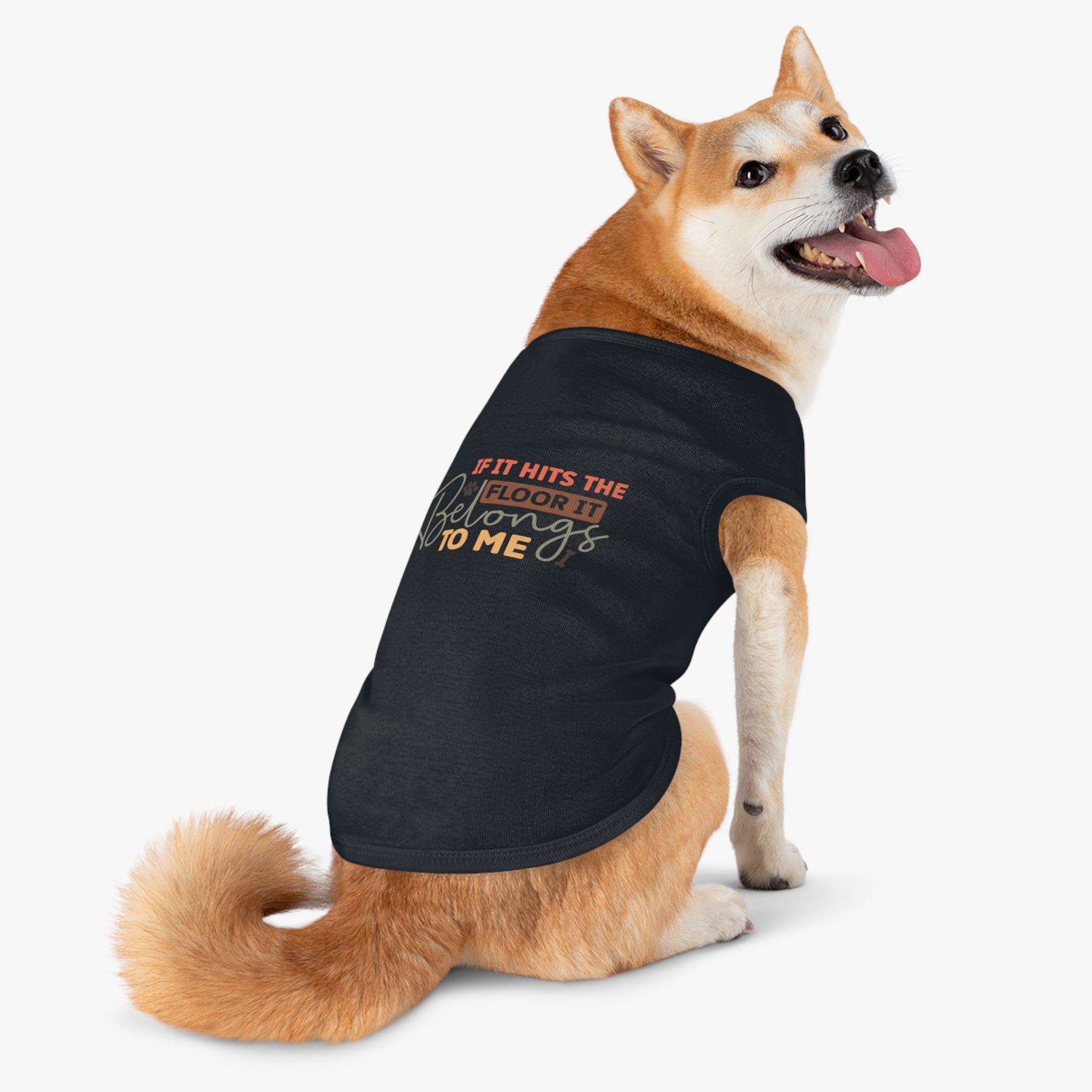 Shiba Inu wearing a black eco-friendly pet tank top with playful If It Hits The Floor It Belongs To Me print