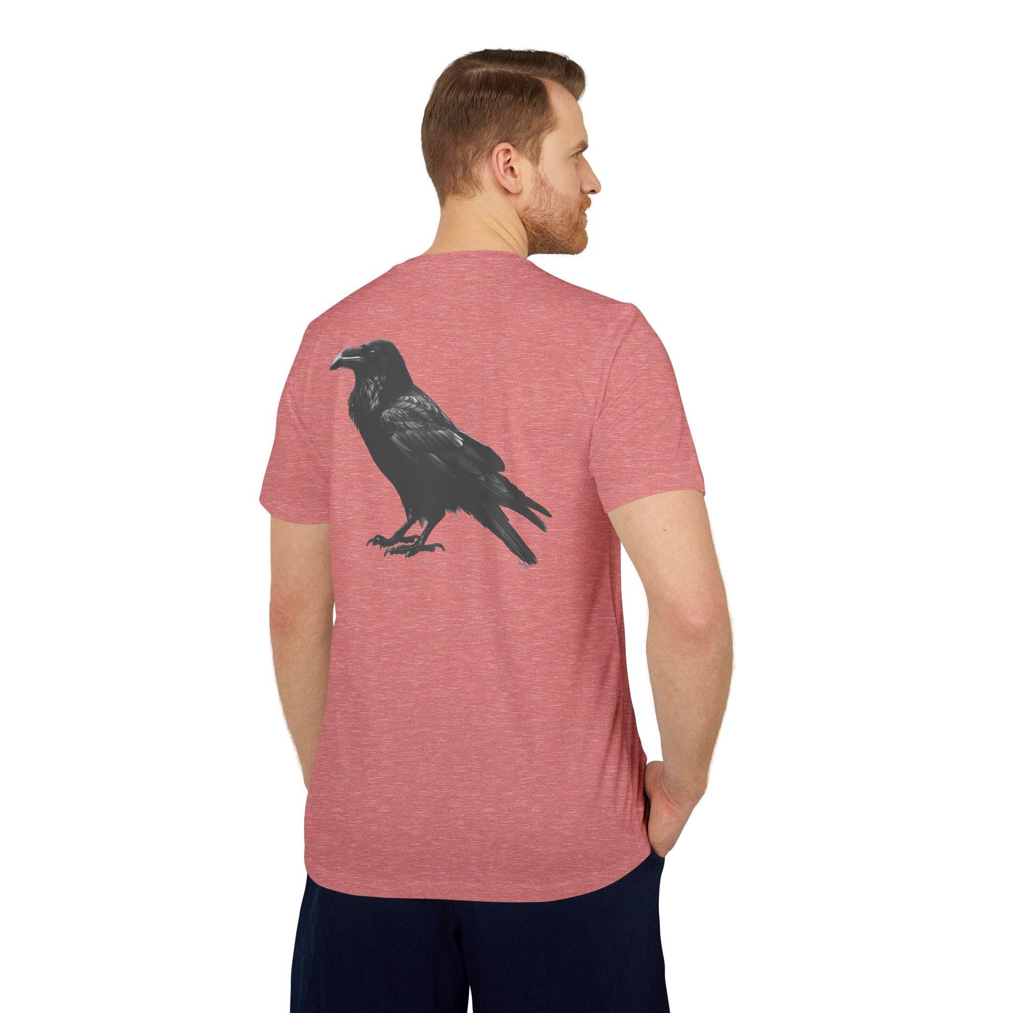 Man wearing a red eco-friendly Adidas sport t-shirt with black raven graphic on the back
