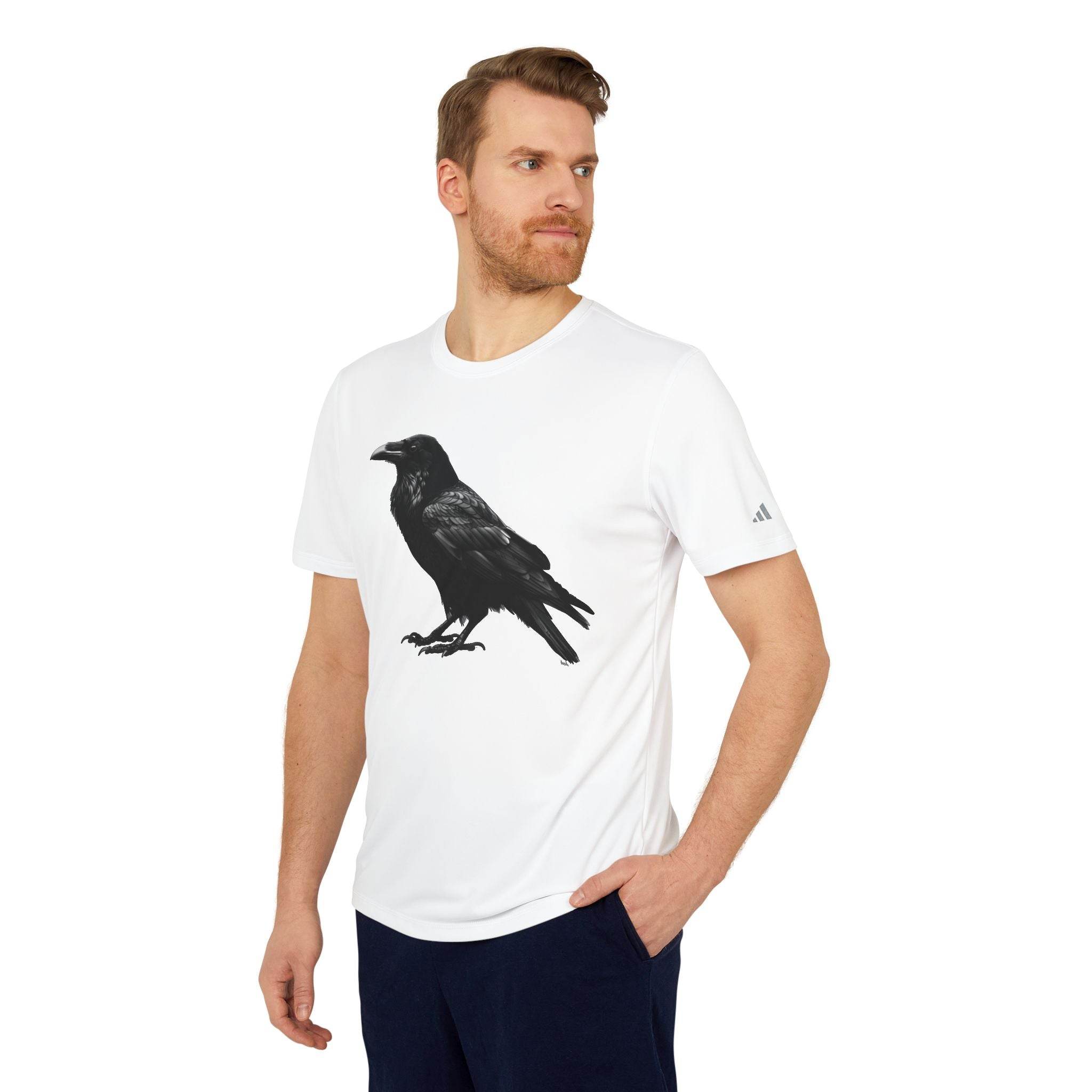 Man wearing eco-friendly Adidas sport t-shirt with black raven graphic and short sleeves