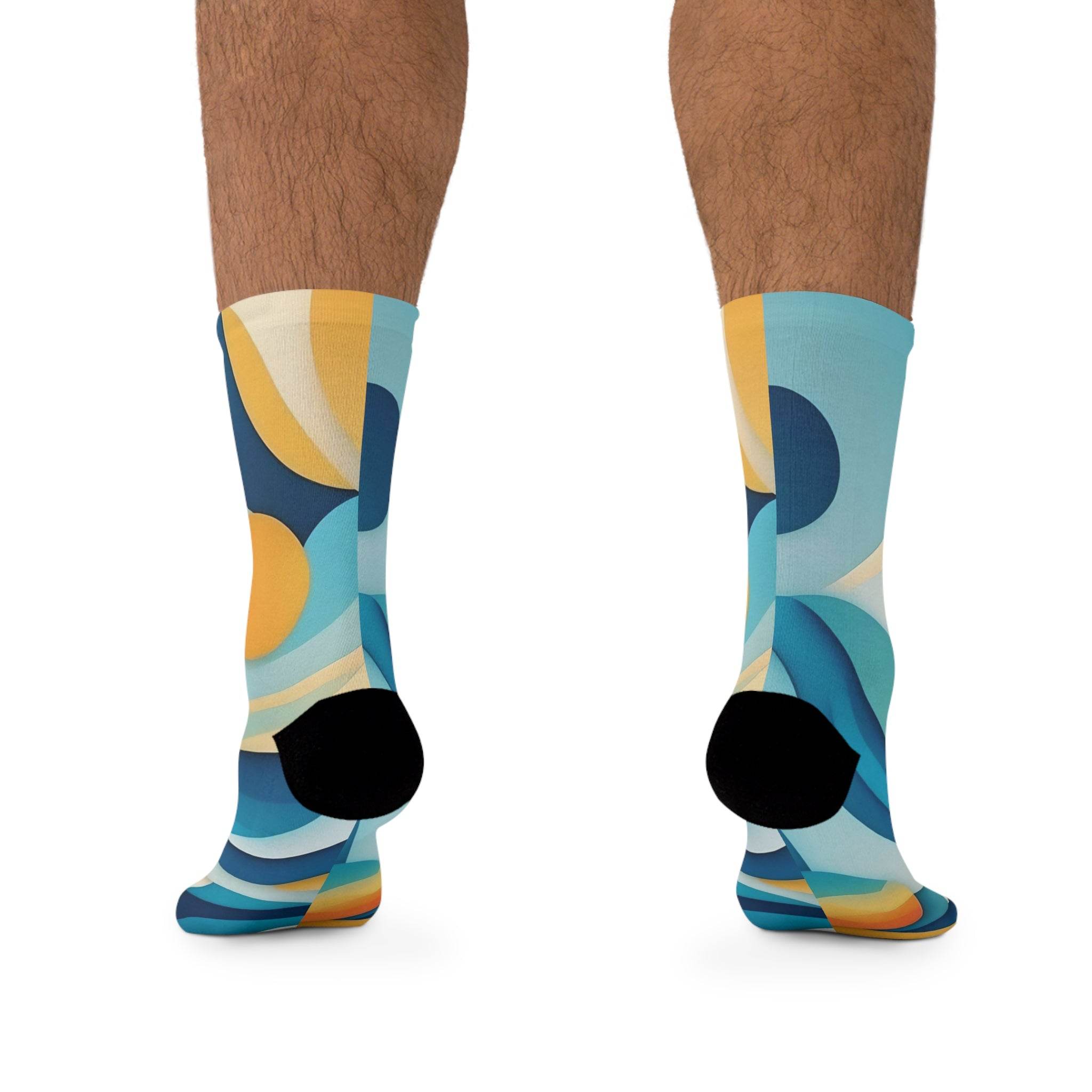 Printify colorful abstract pattern eco-friendly recycled socks worn on feet with black heel and toe