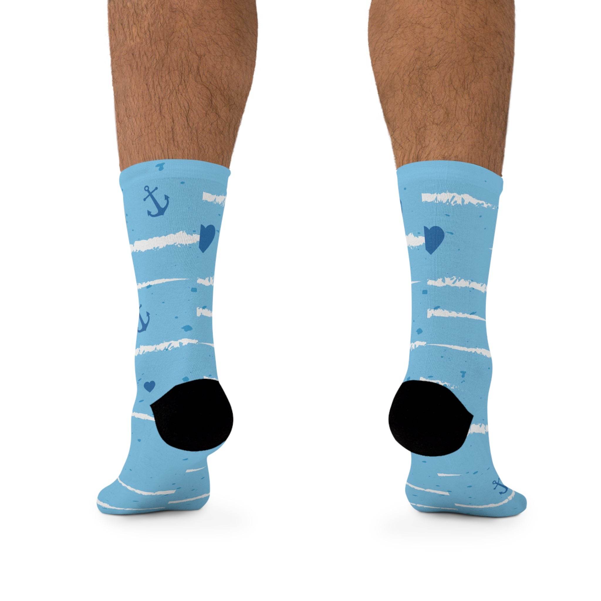 Printify blue recycled poly socks with anchor and heart patterns worn on feet