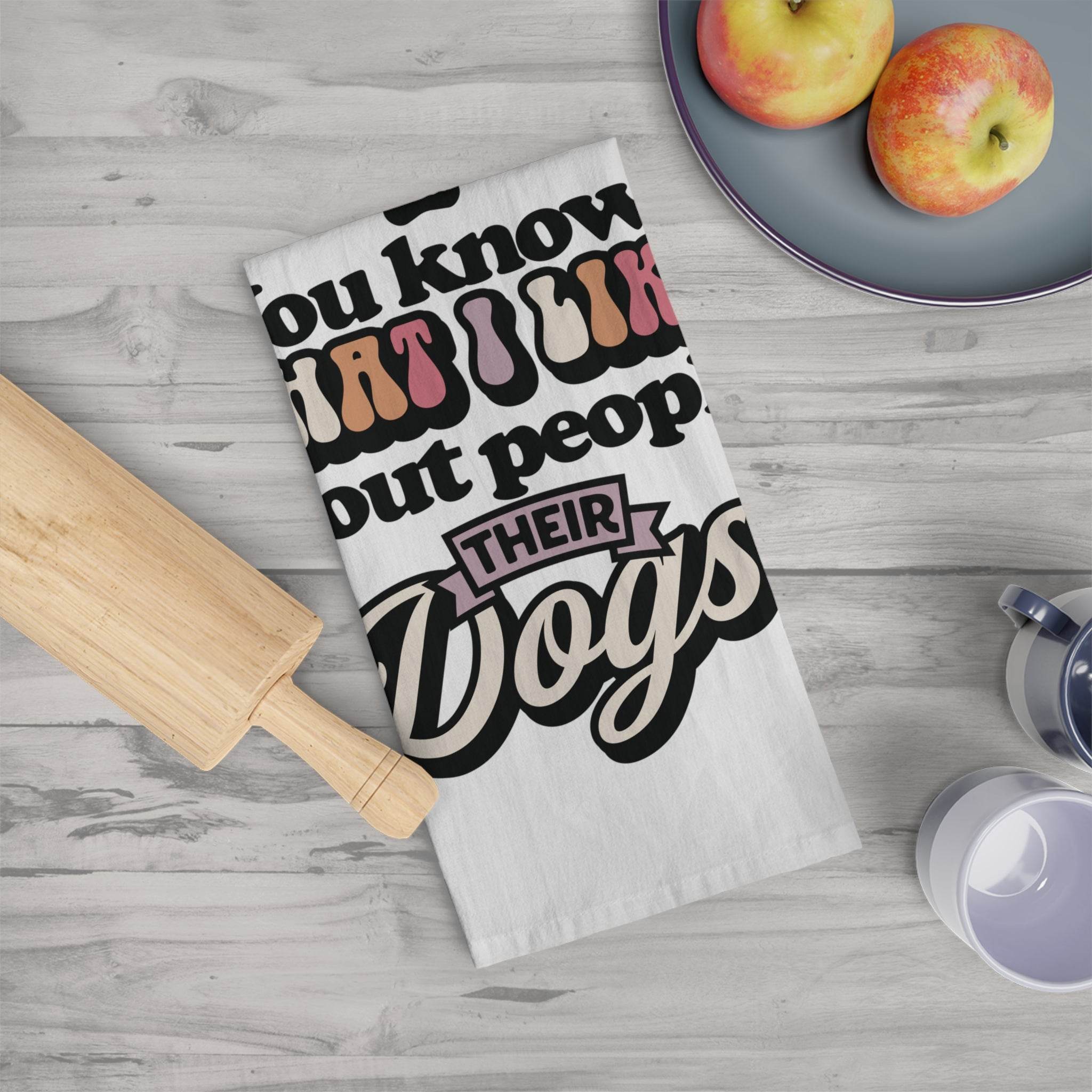 Printify sustainable kitchen towels with funny dog quote displayed on wooden kitchen table