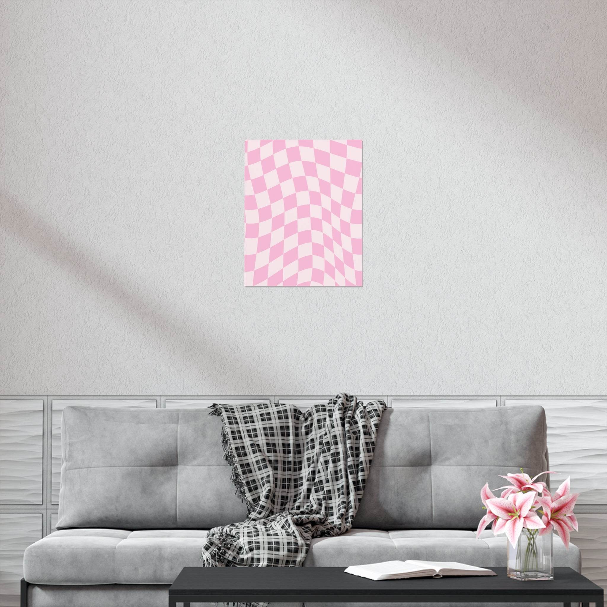 Pink checkered pattern sustainable uncoated posters hanging above gray sofa in modern living room