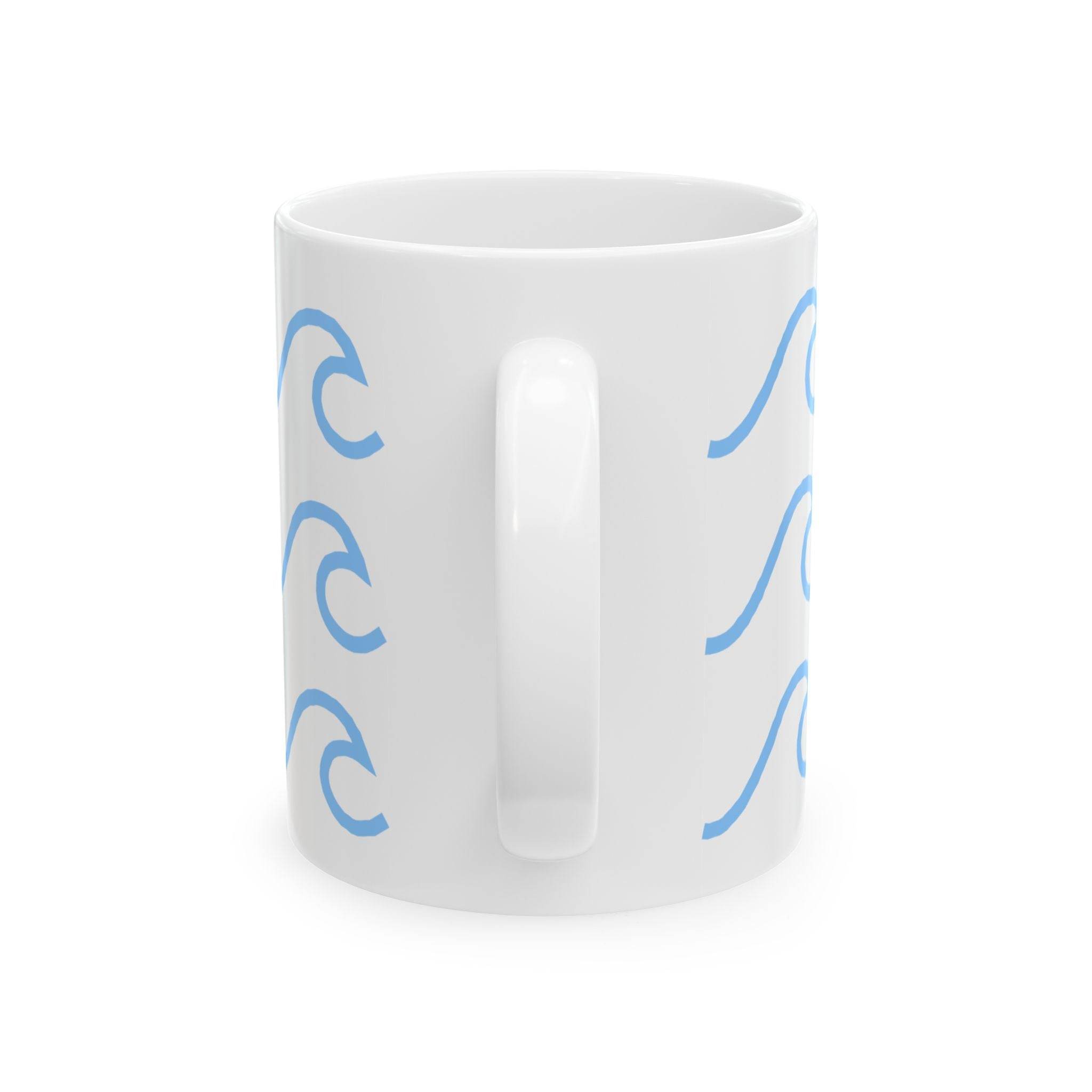 White ceramic mug with wave pattern in blue on both sides and a handle in the center