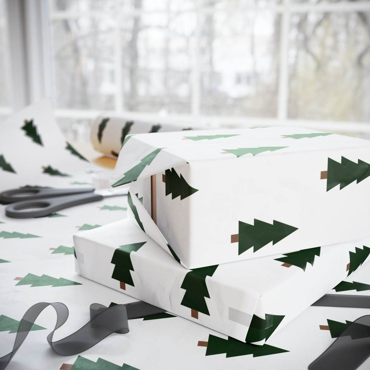 Printify Christmas tree wrapping paper with green tree design used to wrap holiday gifts near scissors and ribbon