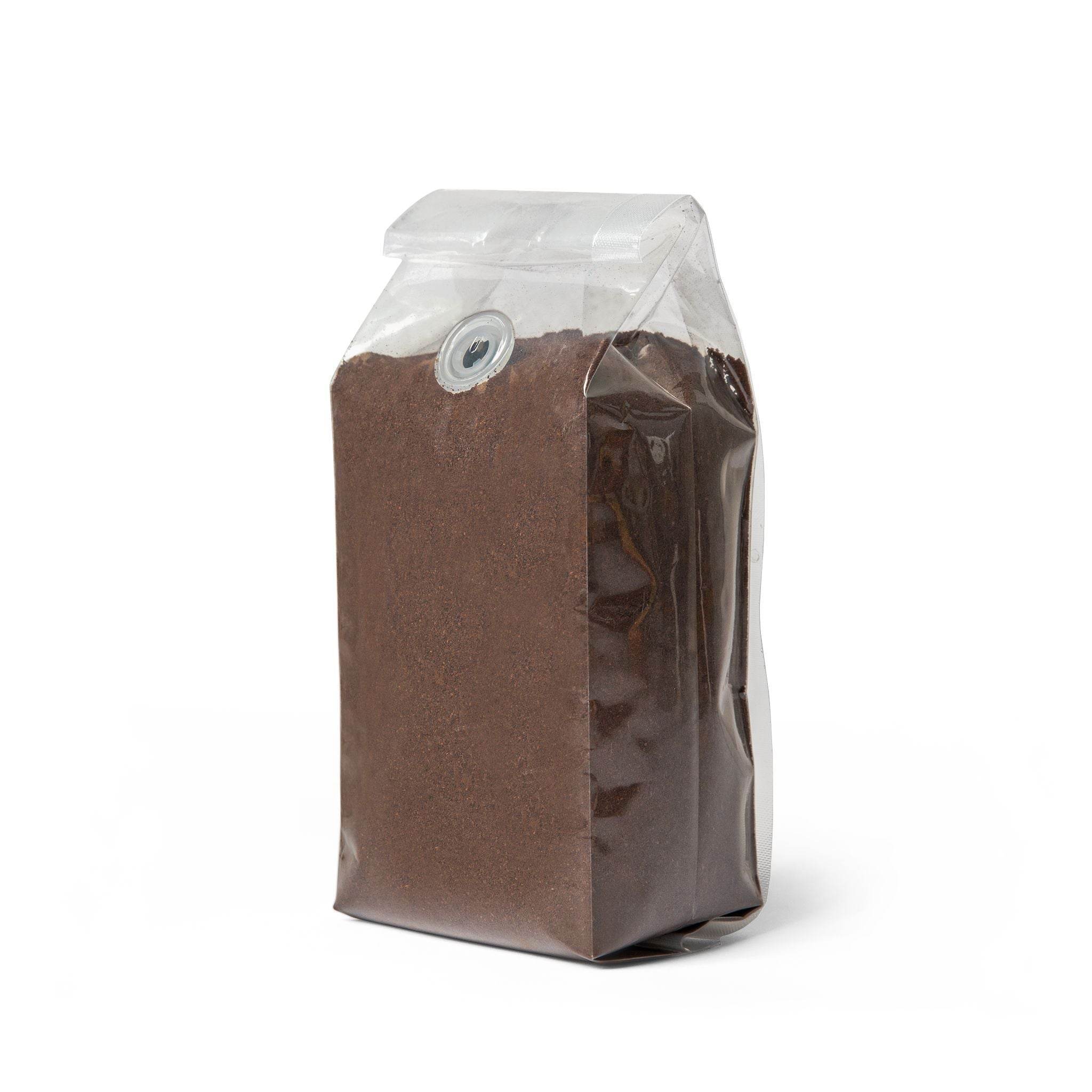 Printify medium-dark roast sustainable coffee ground in a clear resealable bag with one-way valve