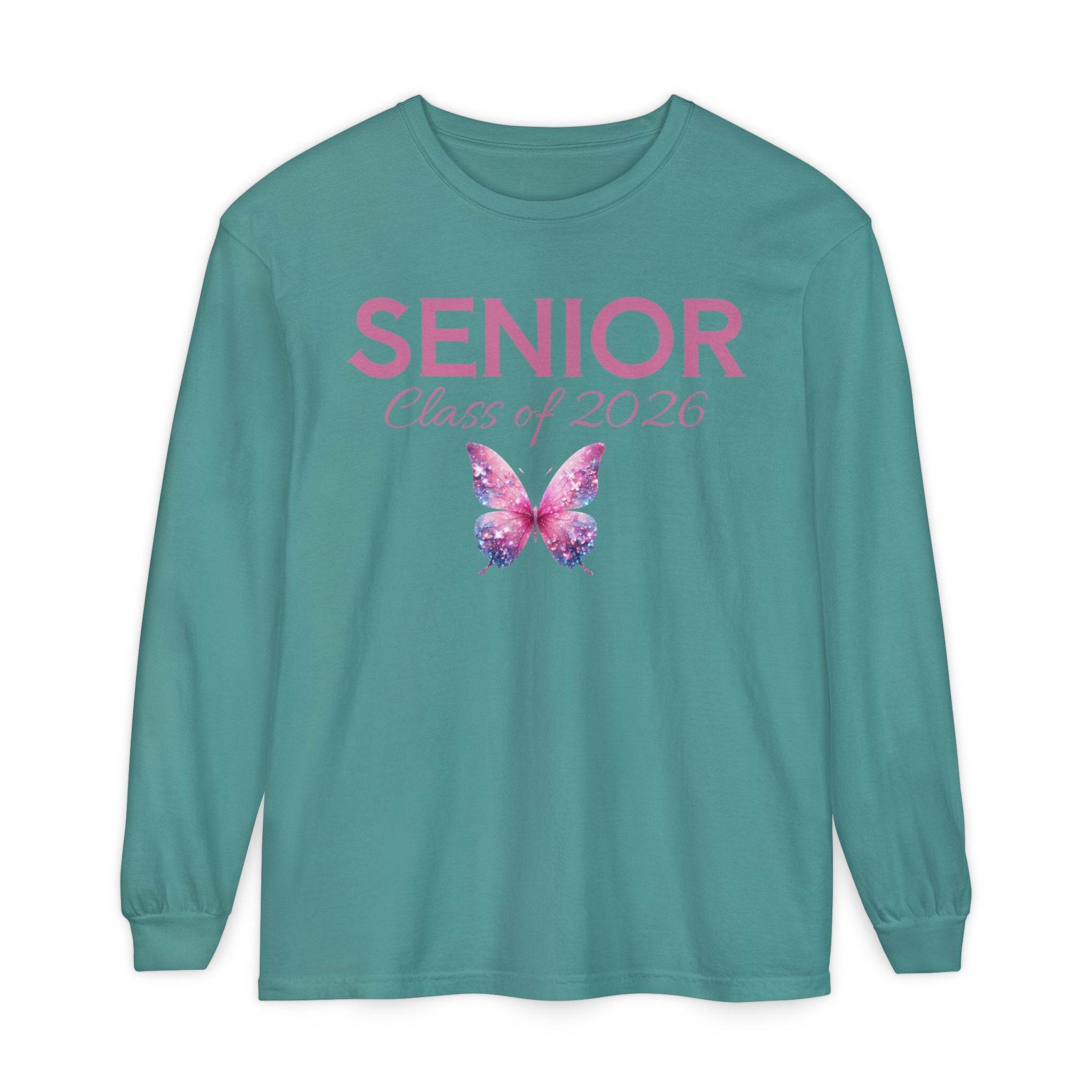 Printify teal long sleeve shirt with pink SENIOR and Class of 2026 script above butterfly graphic senior class of 2026 shirt