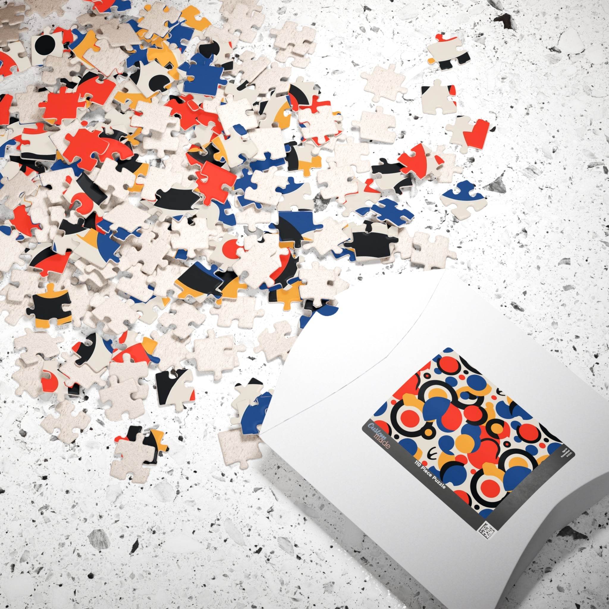 Printify colorful eco puzzle with scattered vibrant pieces and modern abstract design on packaging