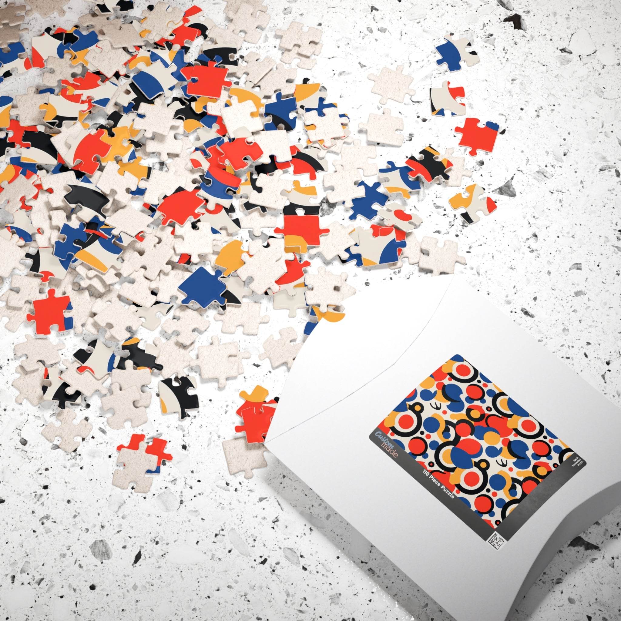 Colorful eco puzzle by Printify with scattered multicolored pieces and packaging on a white surface