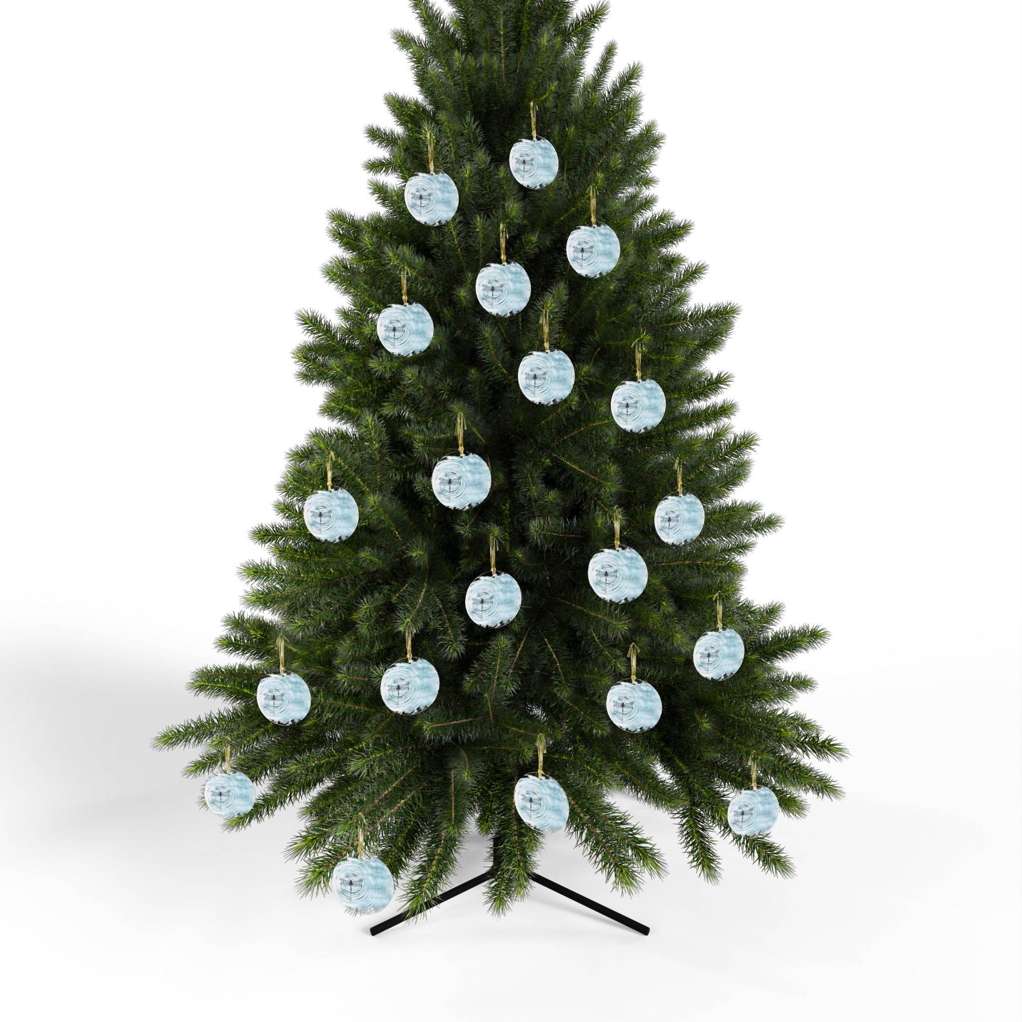 Christmas tree decorated with multiple blue dragonfly christmas ornaments from Printify