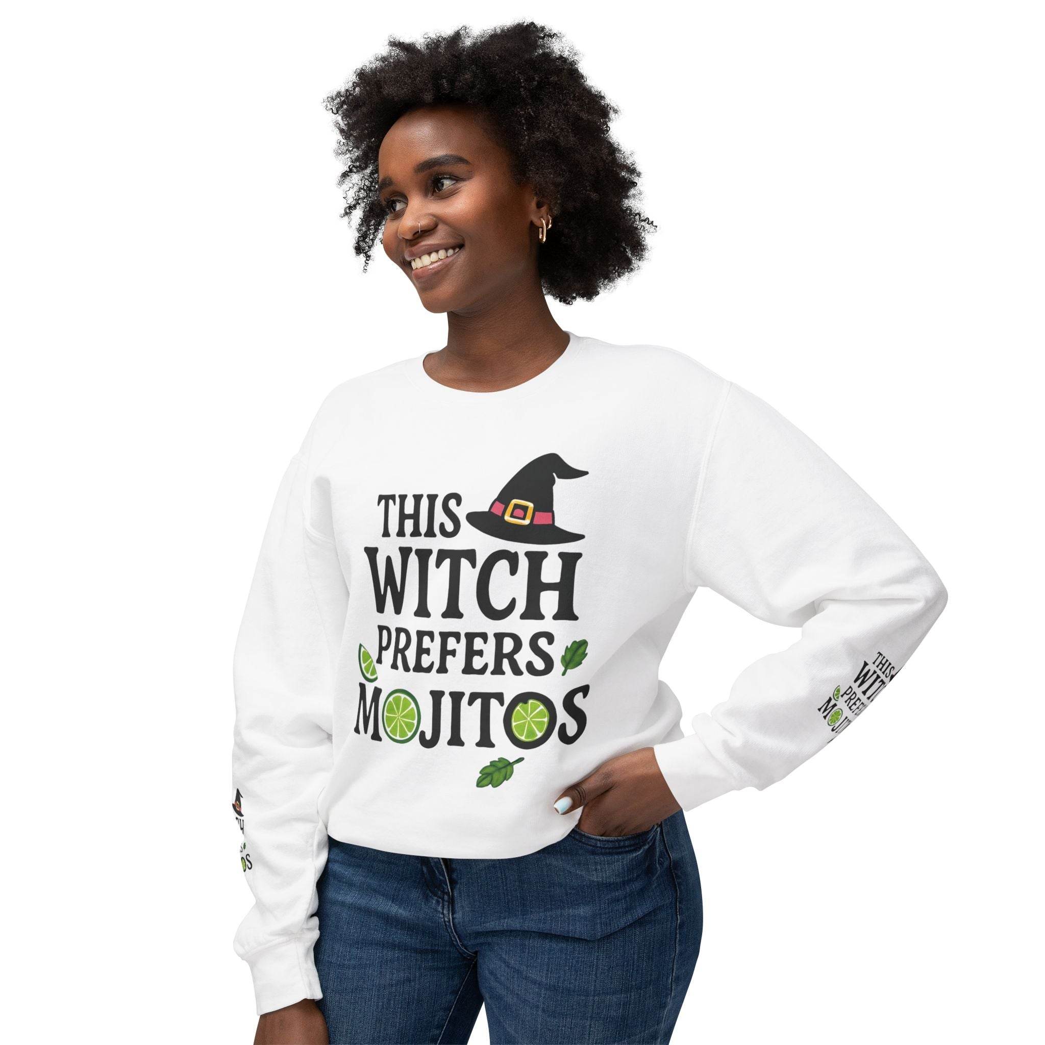 Model wearing a white eco-friendly witch sweatshirt with This Witch Prefers Mojitos print and lime graphics