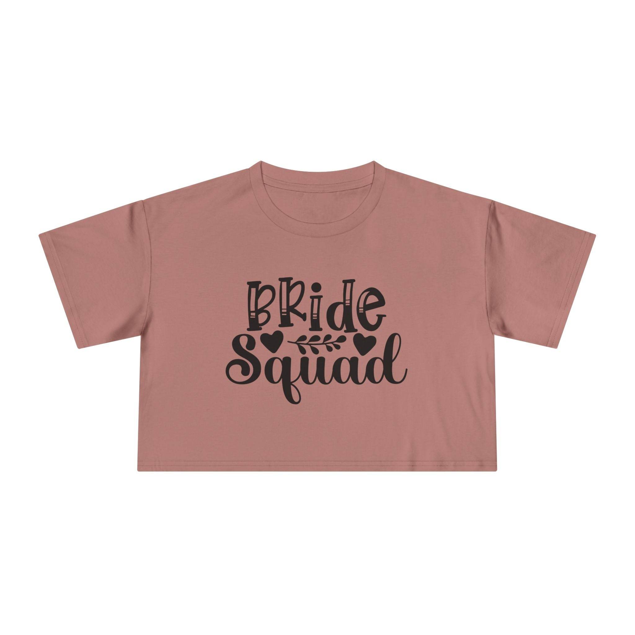 Dusty rose crop top with black Bride Squad script and leaf graphic eco-friendly bride squad crop top from Printify