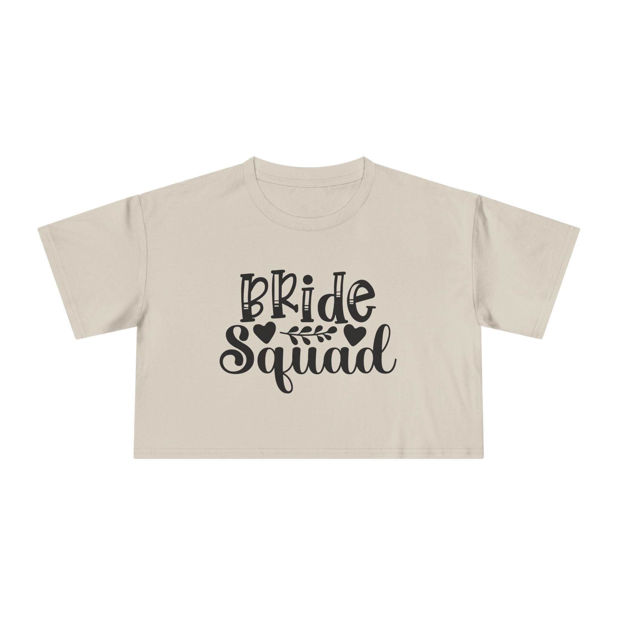 eco-friendly bride squad crop top beige cropped tee with black Bride Squad script and leaf design