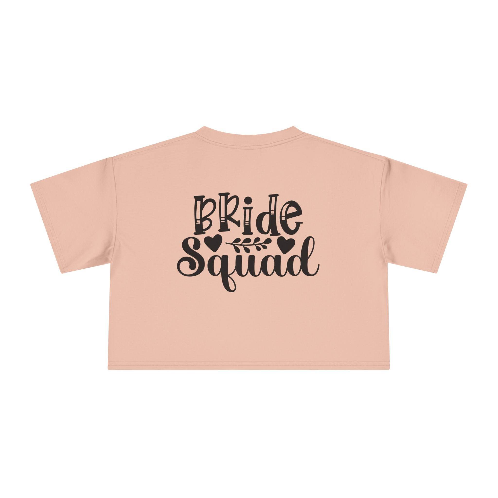 Printify blush crop t shirt back with black Bride Squad script and hearts eco-friendly bride squad crop top for bachelorette parties