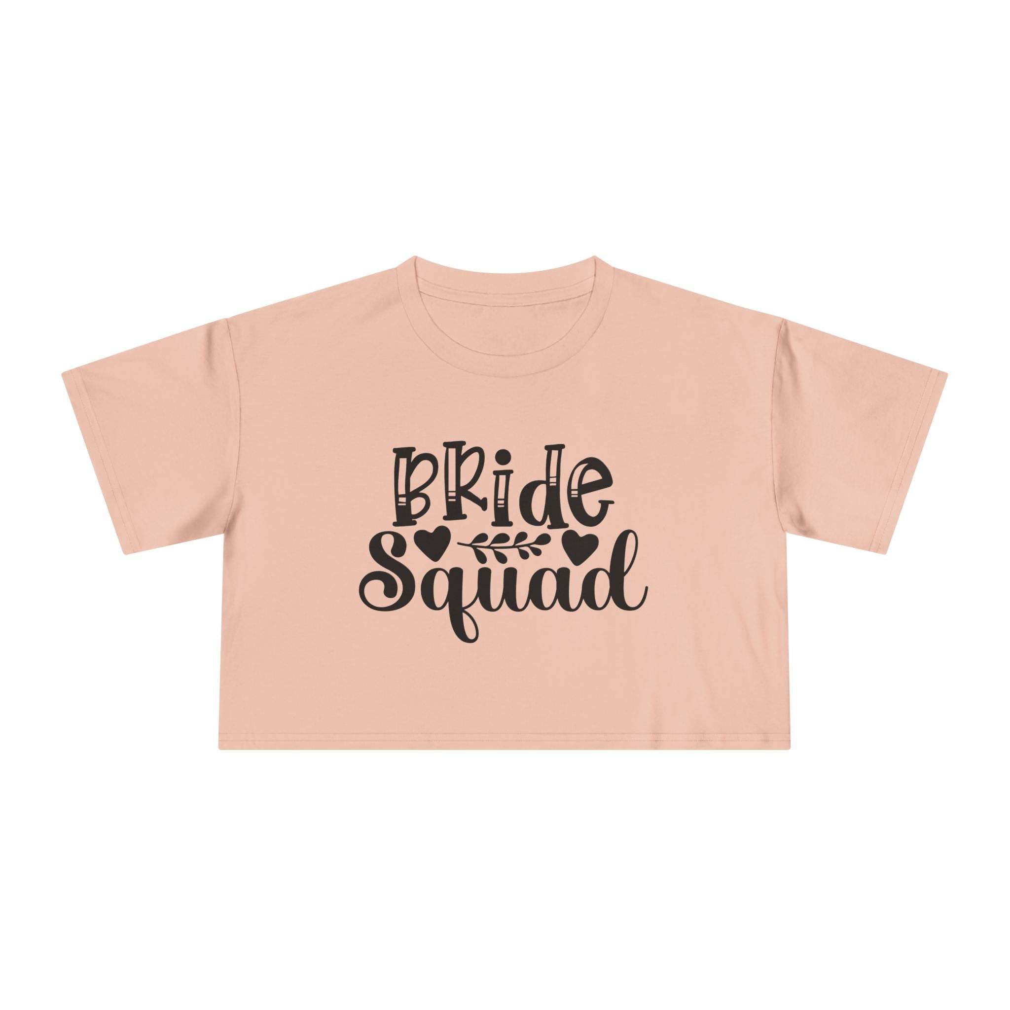 Printify eco-friendly bride squad crop top blush pink with black Bride Squad script and leaf design for wedding party
