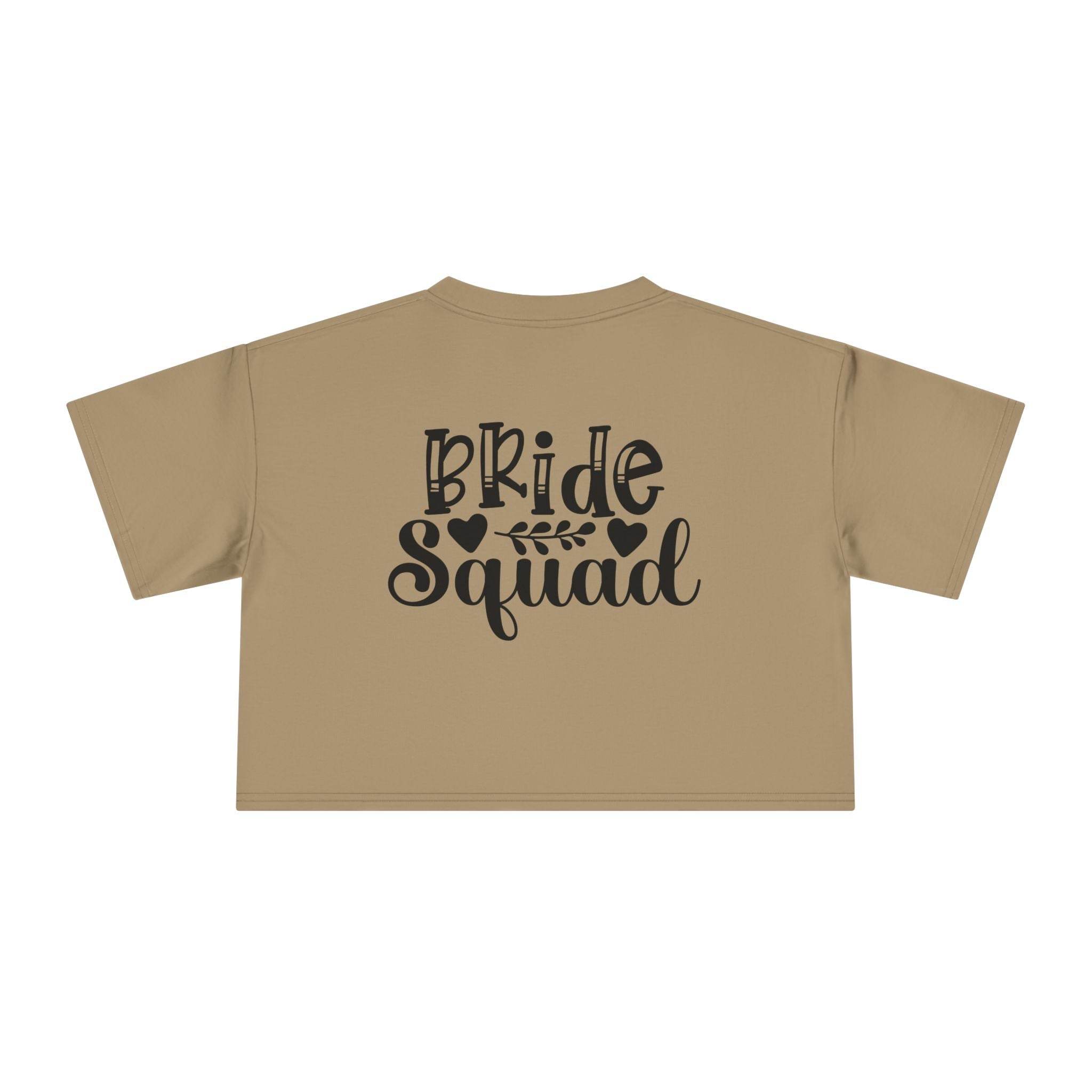 eco-friendly bride squad crop top beige cropped t shirt back view with black Bride Squad script and heart graphics