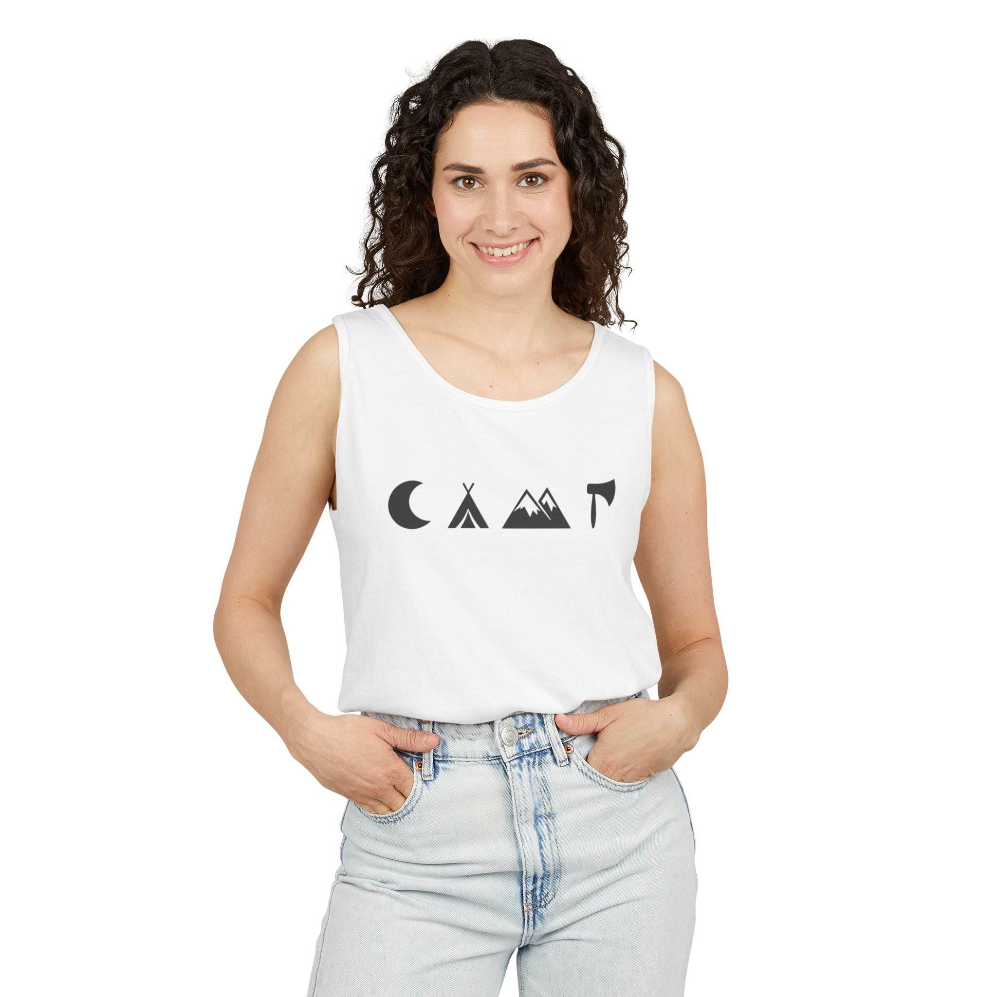 Smiling model wearing Printify eco-friendly unisex tank top in white with minimalist moon teepee mountain and axe icons