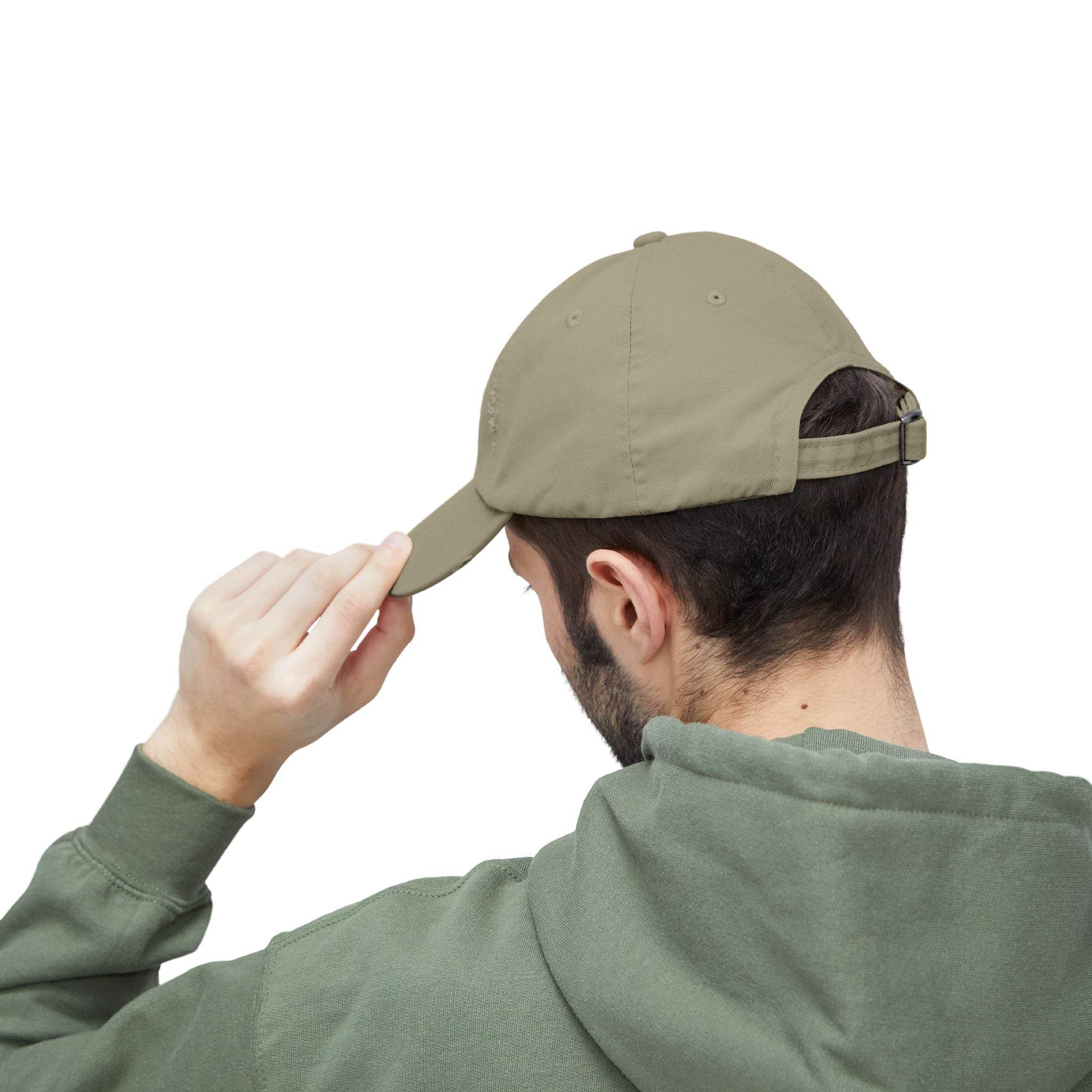Printify eco-friendly pet lover hat olive baseball cap shown from back on man adjusting brim wearing green hoodie