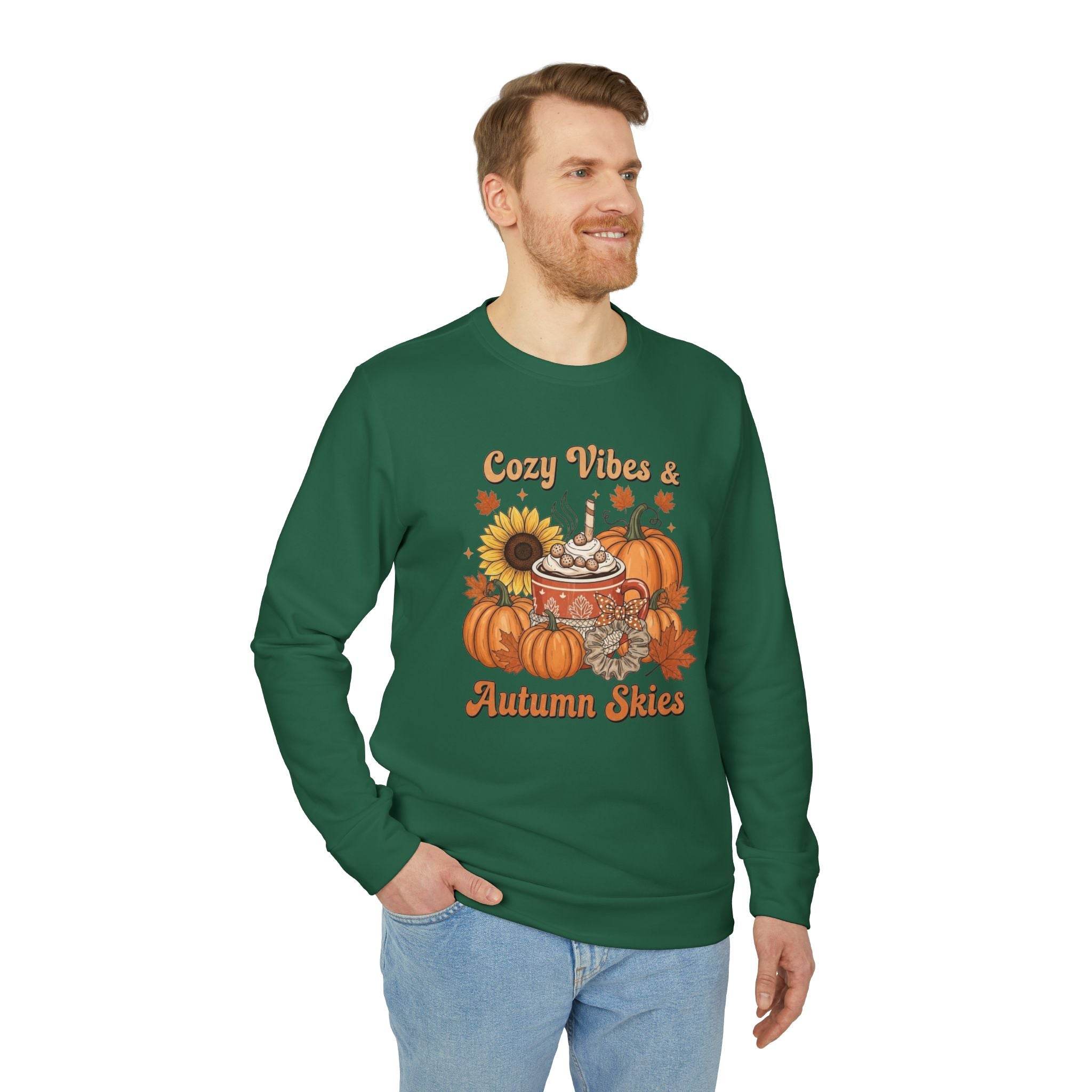 Printify green crewneck with pumpkin sunflower and hot cocoa design worn by male model eco-friendly autumn sweatshirt