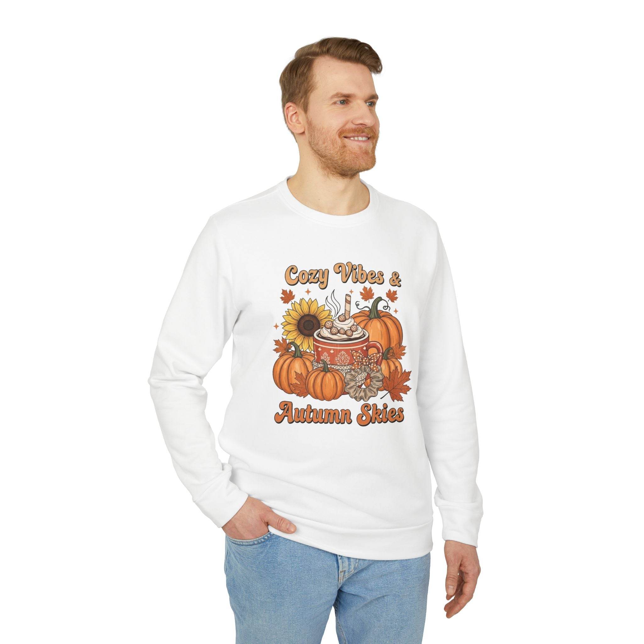 Printify eco-friendly autumn sweatshirt on male model featuring pumpkins sunflower mug and Cozy Vibes and Autumn Skies design