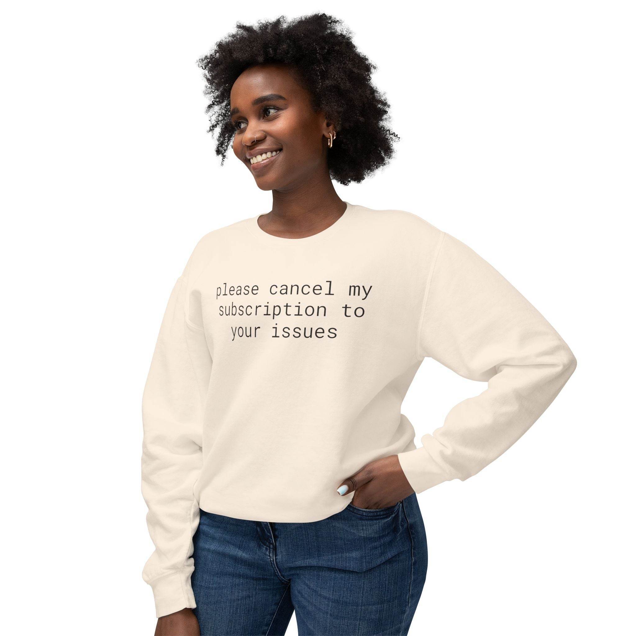 Printify eco-friendly funny sweatshirt cream crewneck with text please cancel my subscription to your issues worn by smiling woman