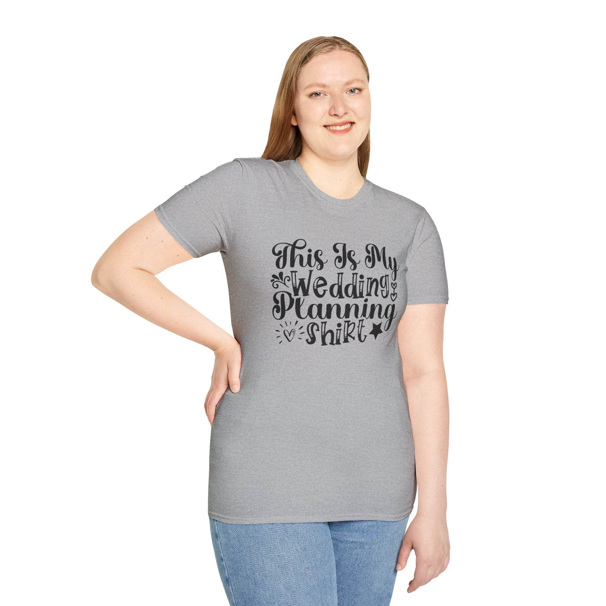 Smiling woman wearing gray short sleeve eco-friendly wedding planning shirt with black scripted text design
