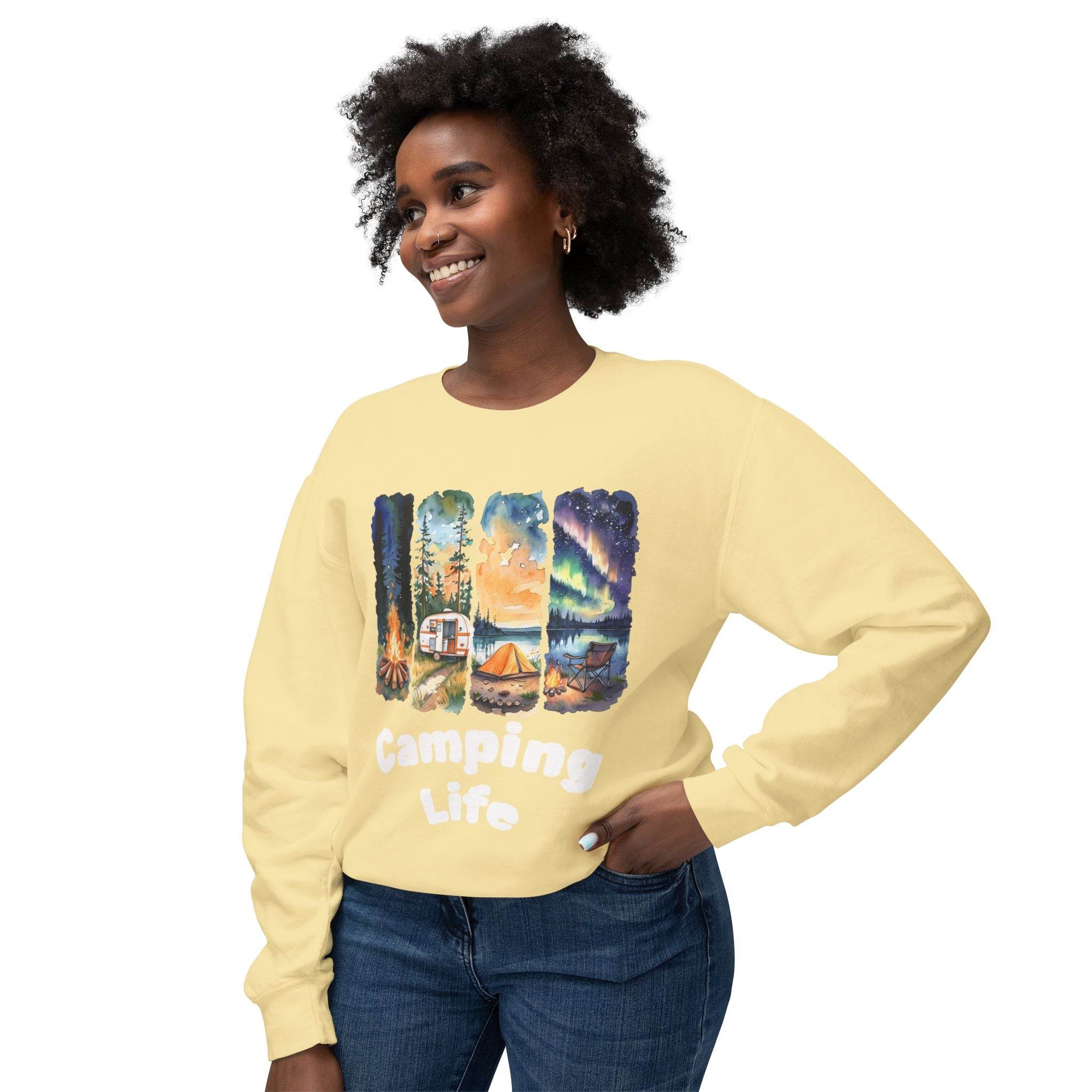 Printify eco-friendly camping sweatshirt pale yellow with camping collage graphic and Camping Life text on smiling model