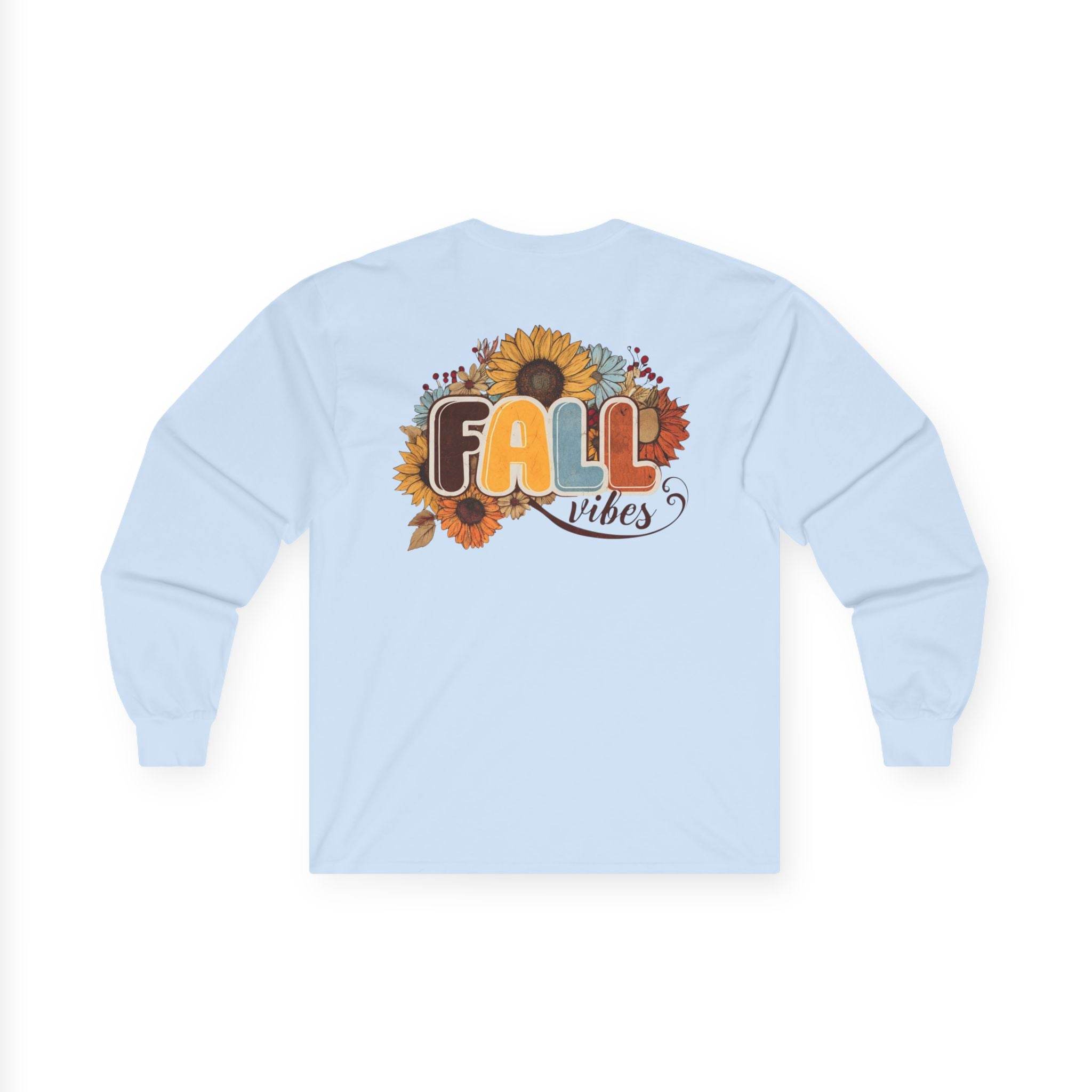 Printify long sleeve light blue shirt with sunflower and autumn leaves Fall vibes design on back eco-friendly fall fashion tee