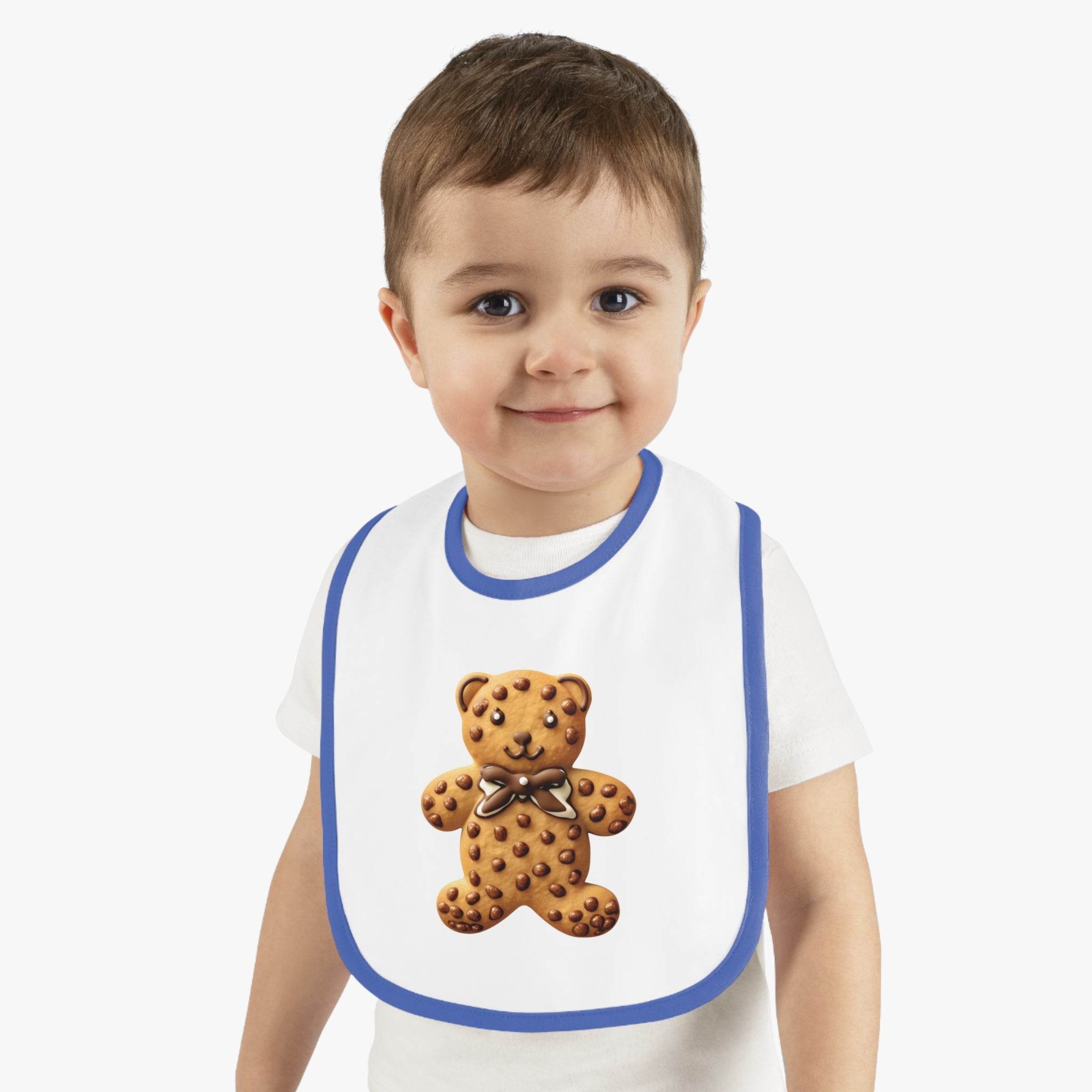 Toddler wearing Printify eco-friendly baby bib with teddy bear cookie design and blue trim