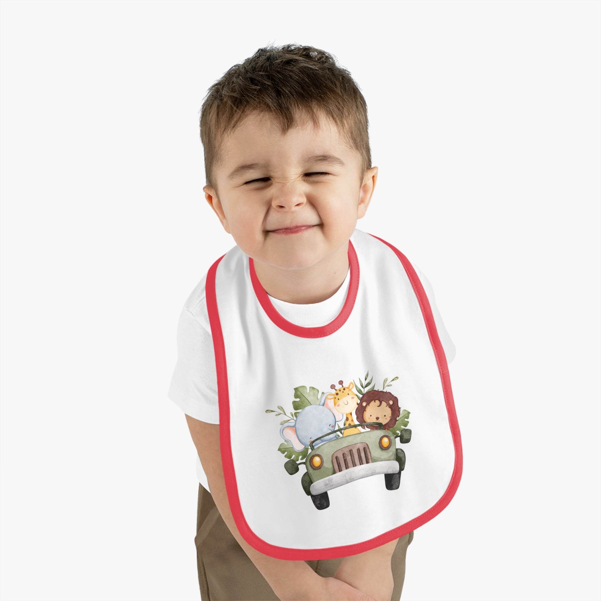 Printify eco-friendly baby bib with red trim featuring cute animal car design worn by smiling toddler