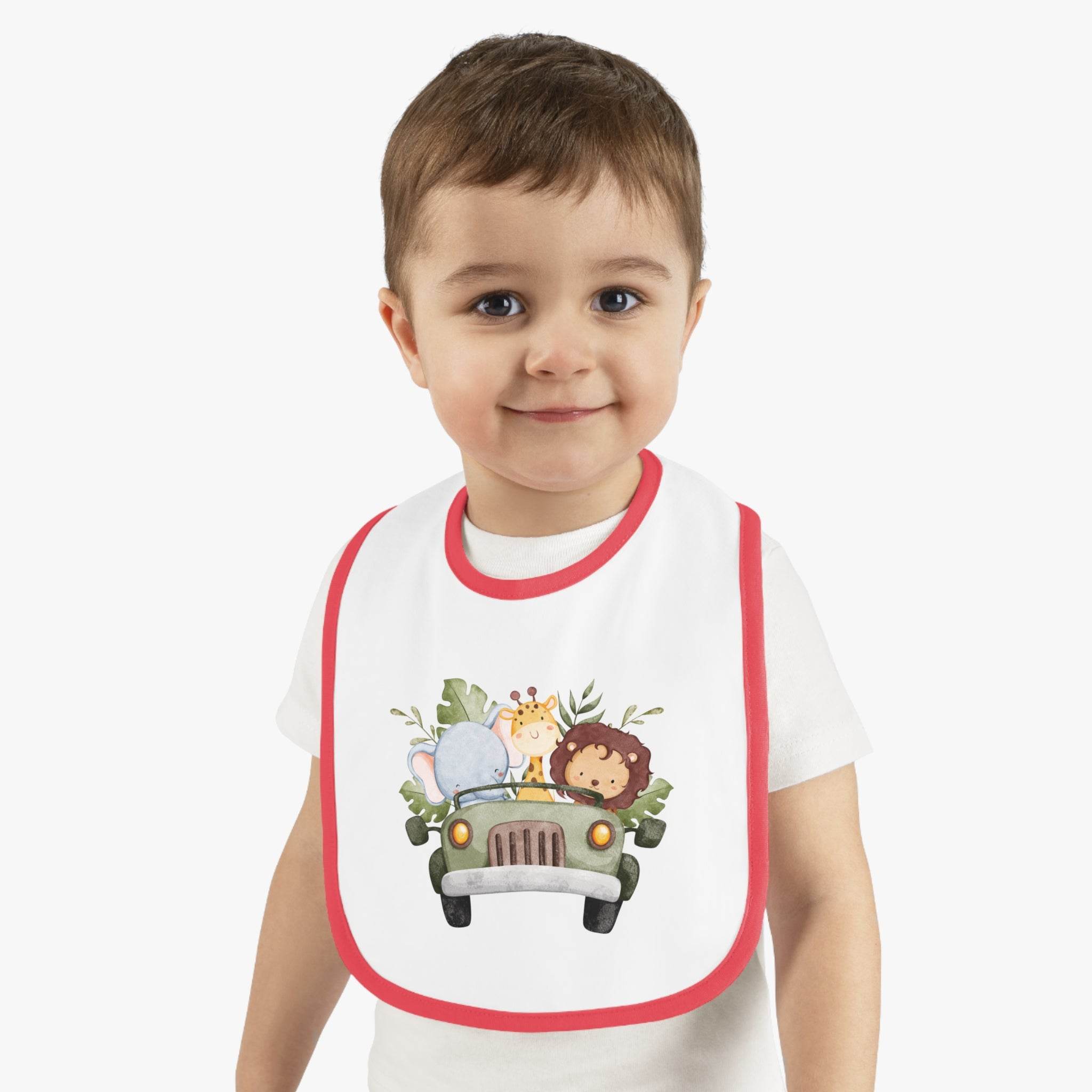 Toddler wearing Printify eco-friendly baby bib with red trim and animal print design