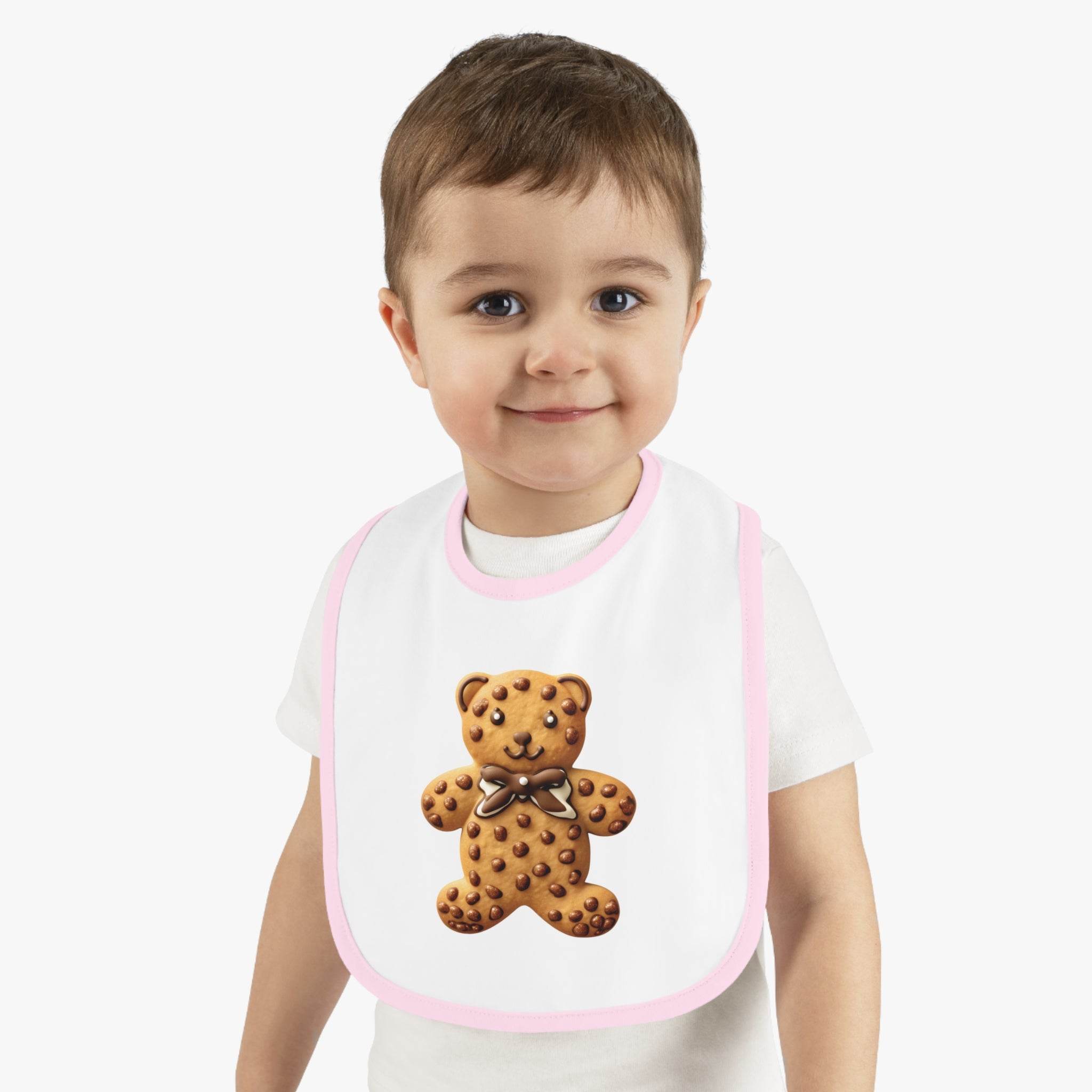 Toddler wearing Printify eco-friendly baby bib with teddy bear cookie design and pink trim