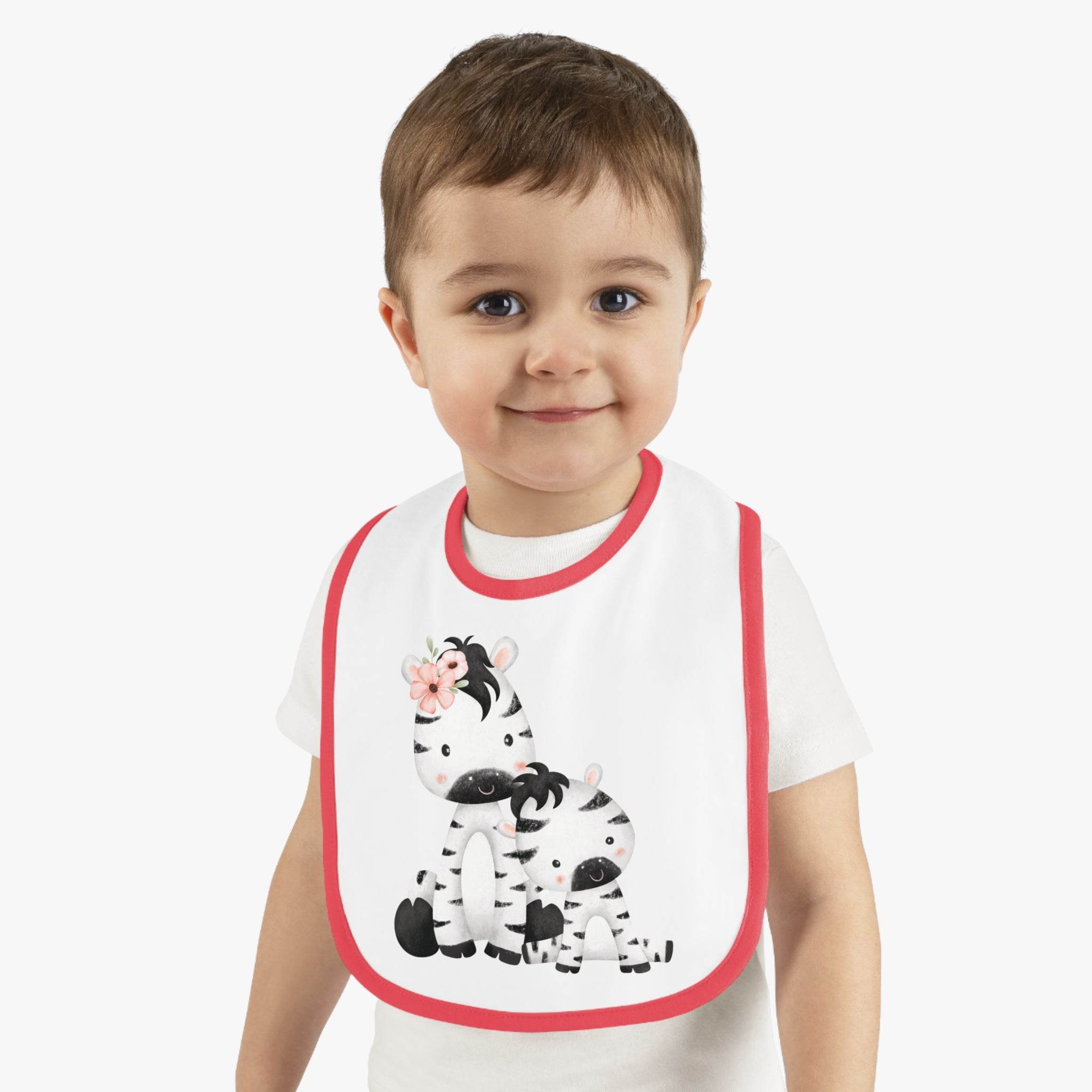 Toddler wearing Printify eco-friendly baby bib with cute zebra design and red trim