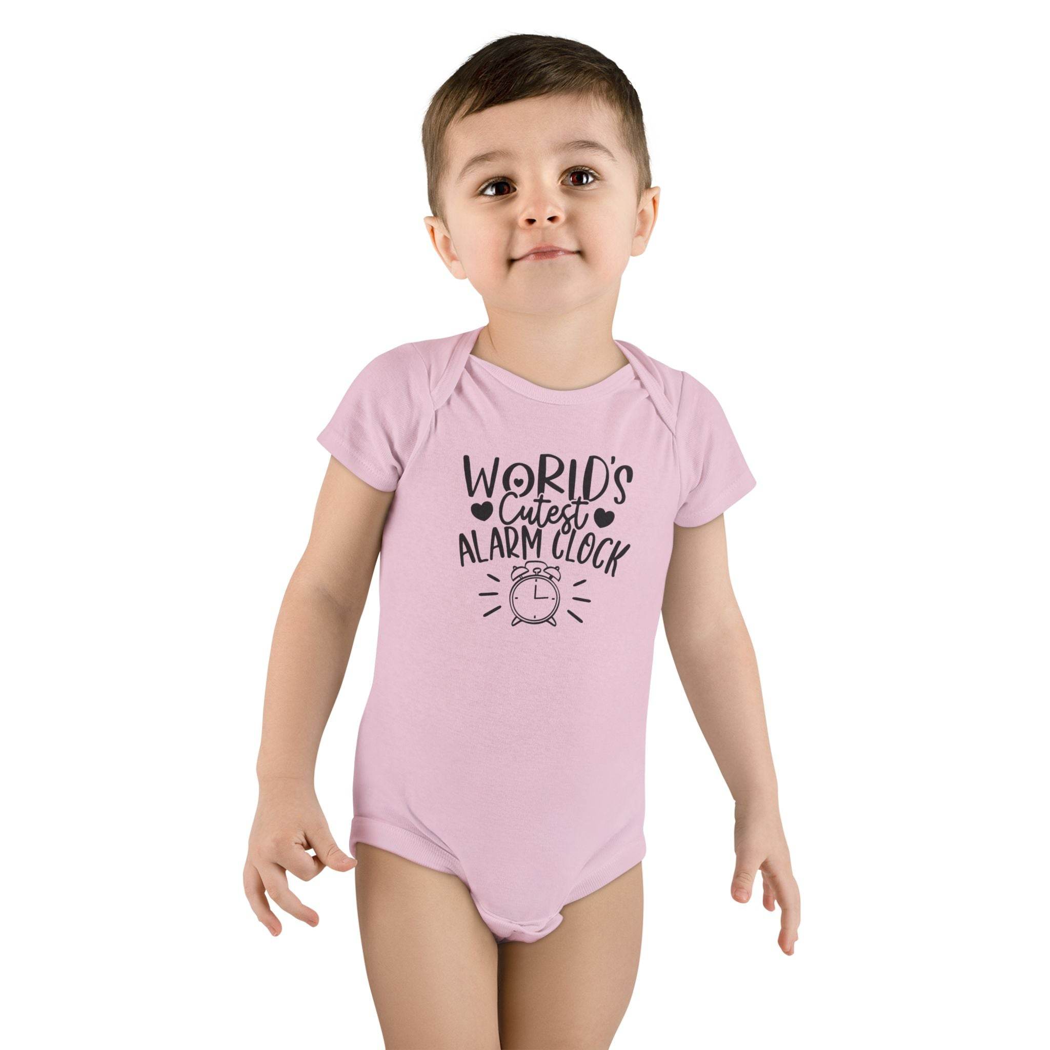 Toddler wearing a pink eco-friendly baby onesie with Worlds Cutest Alarm Clock print