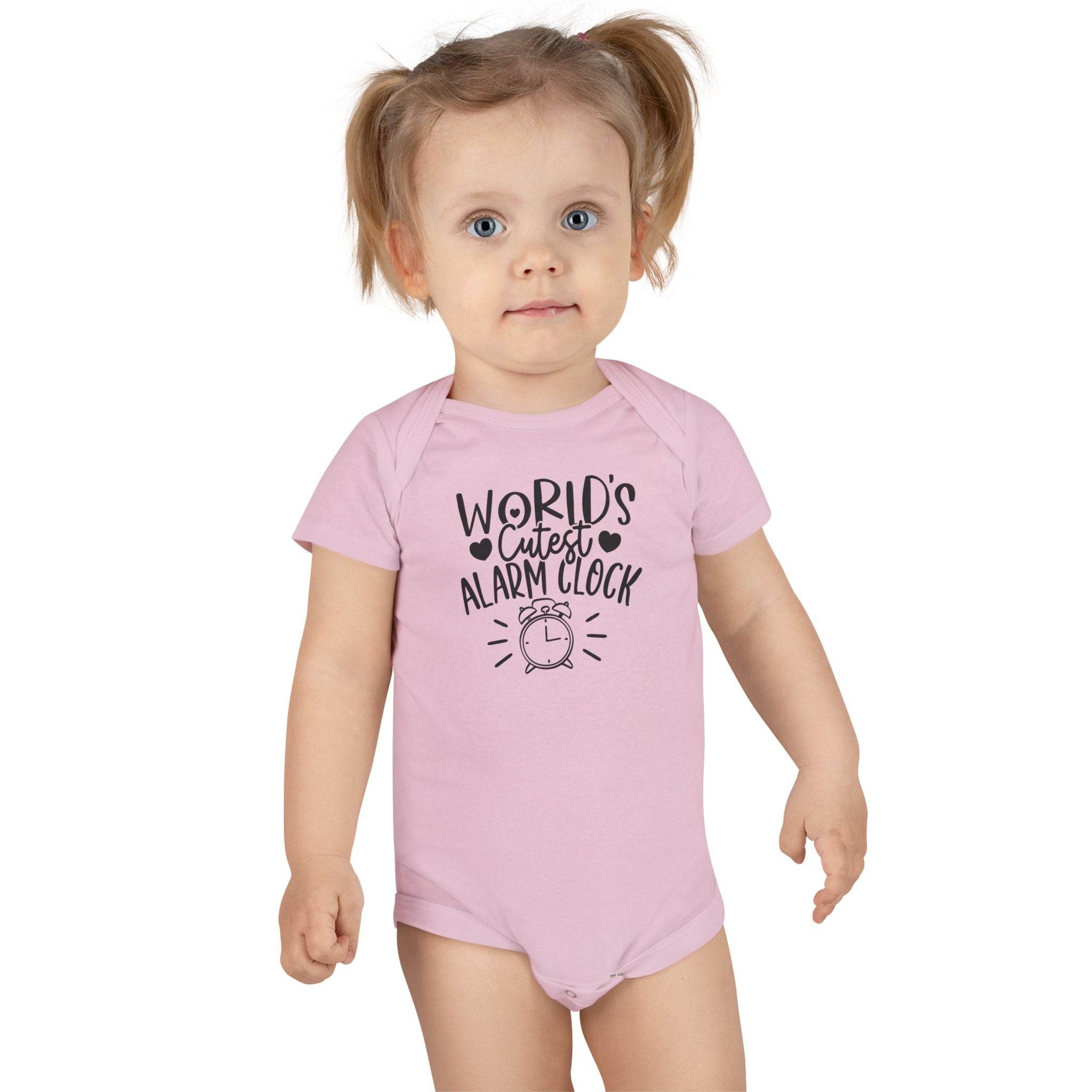 Toddler wearing pink eco-friendly baby onesie with Worlds Cutest Alarm Clock print by Printify