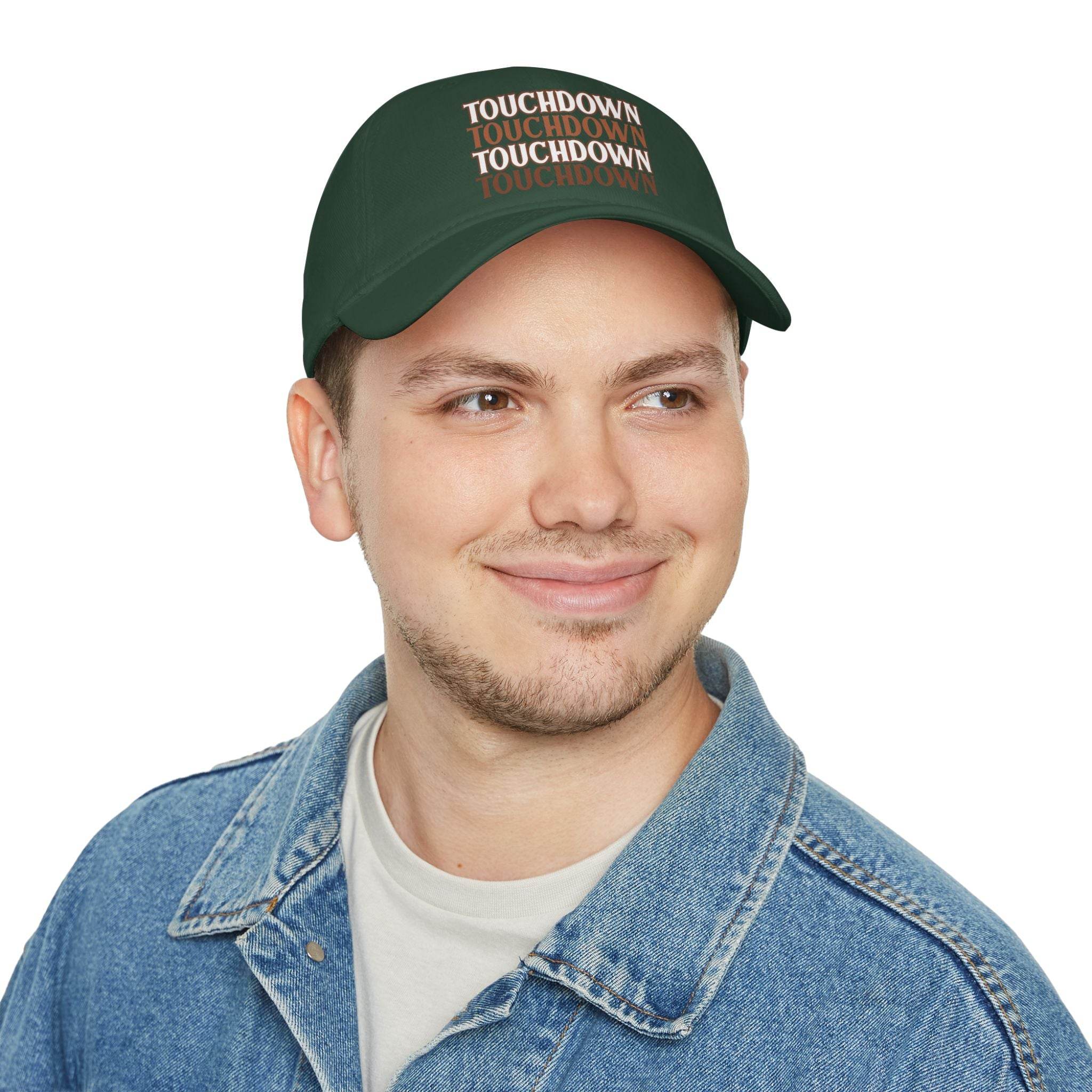 Printify eco-friendly baseball cap in dark green with touchdown text worn by man in denim jacket