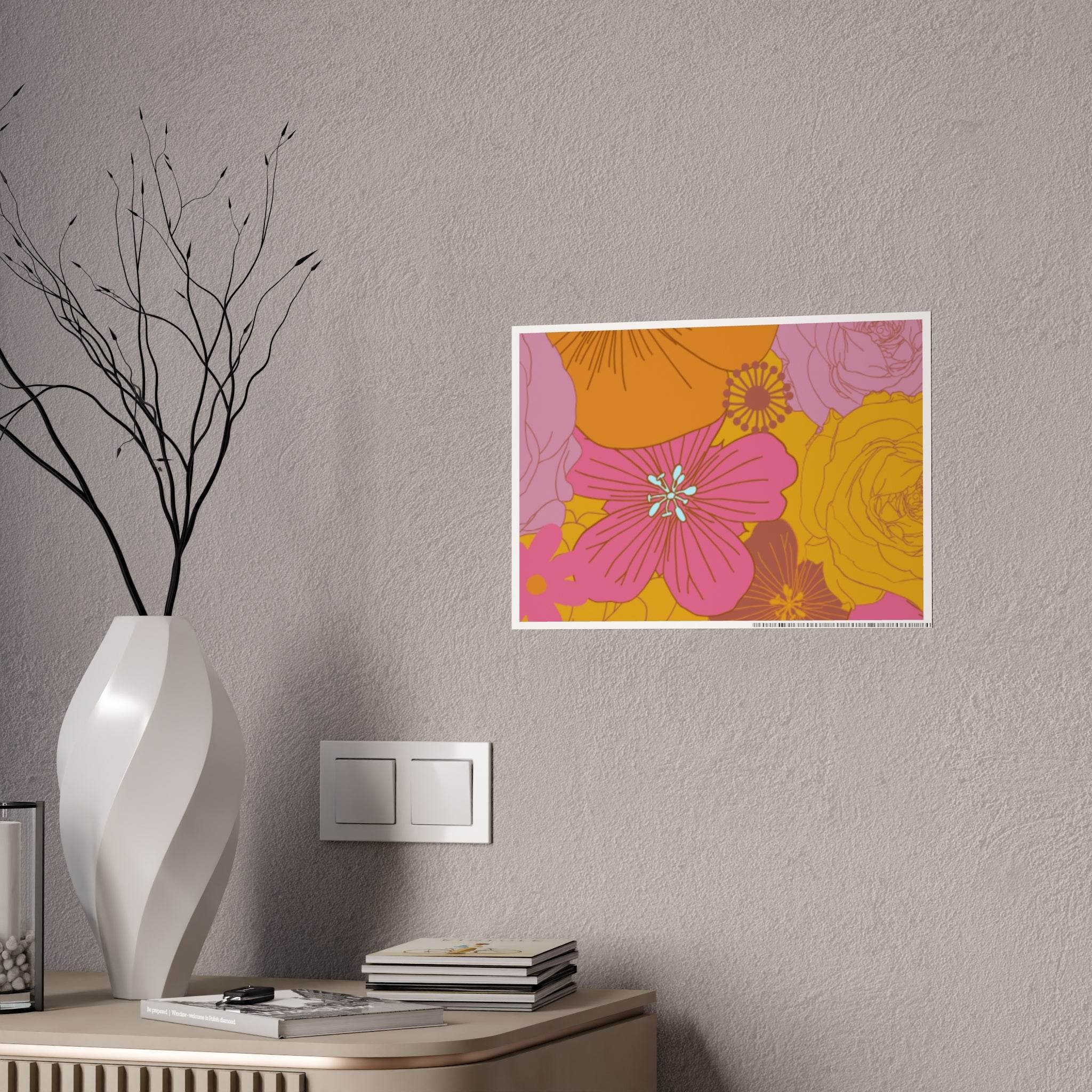 Printed eco-friendly flower posters with colorful floral design on gray wall above wooden dresser