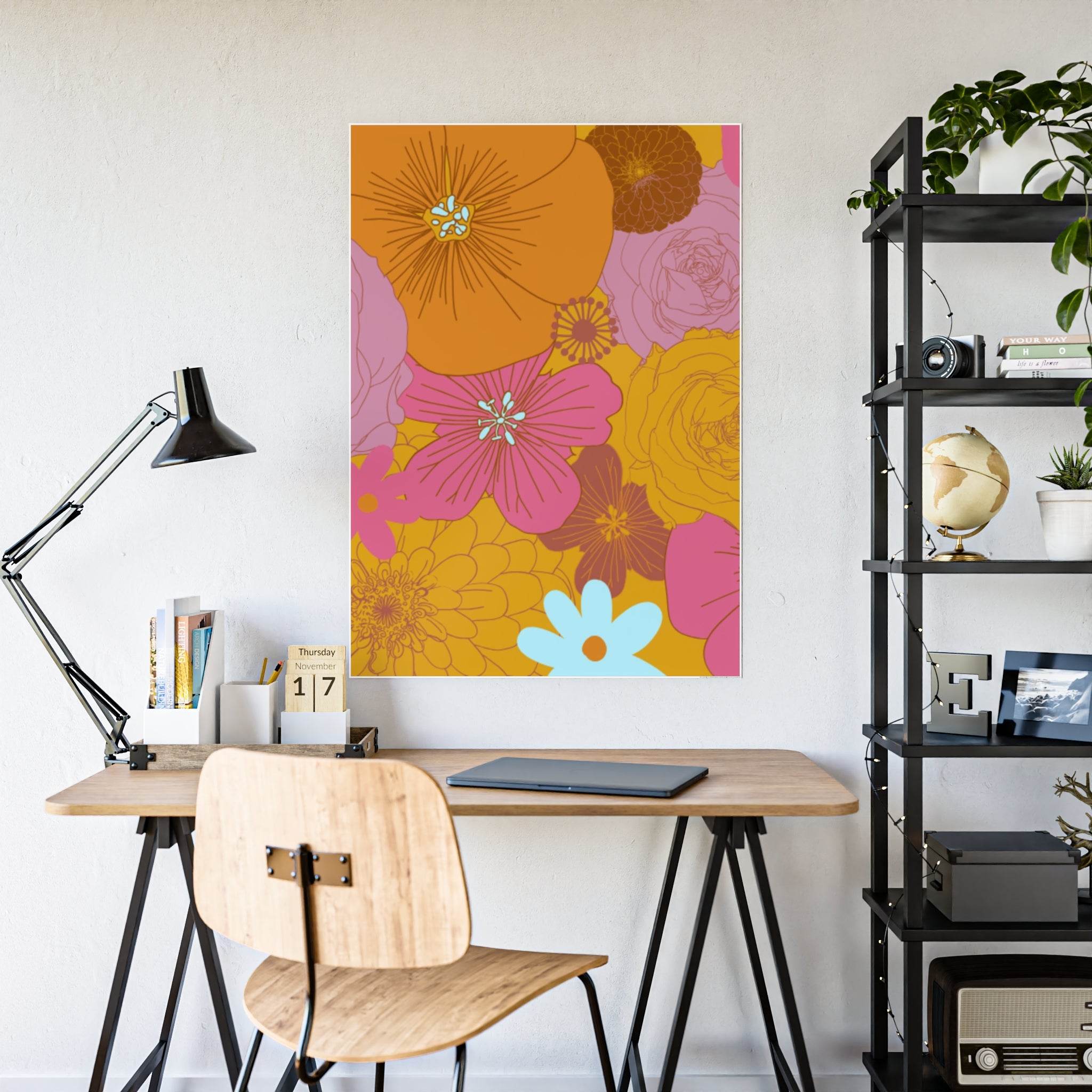 Eco-friendly flower posters featuring colorful floral design displayed above a modern wooden desk setup