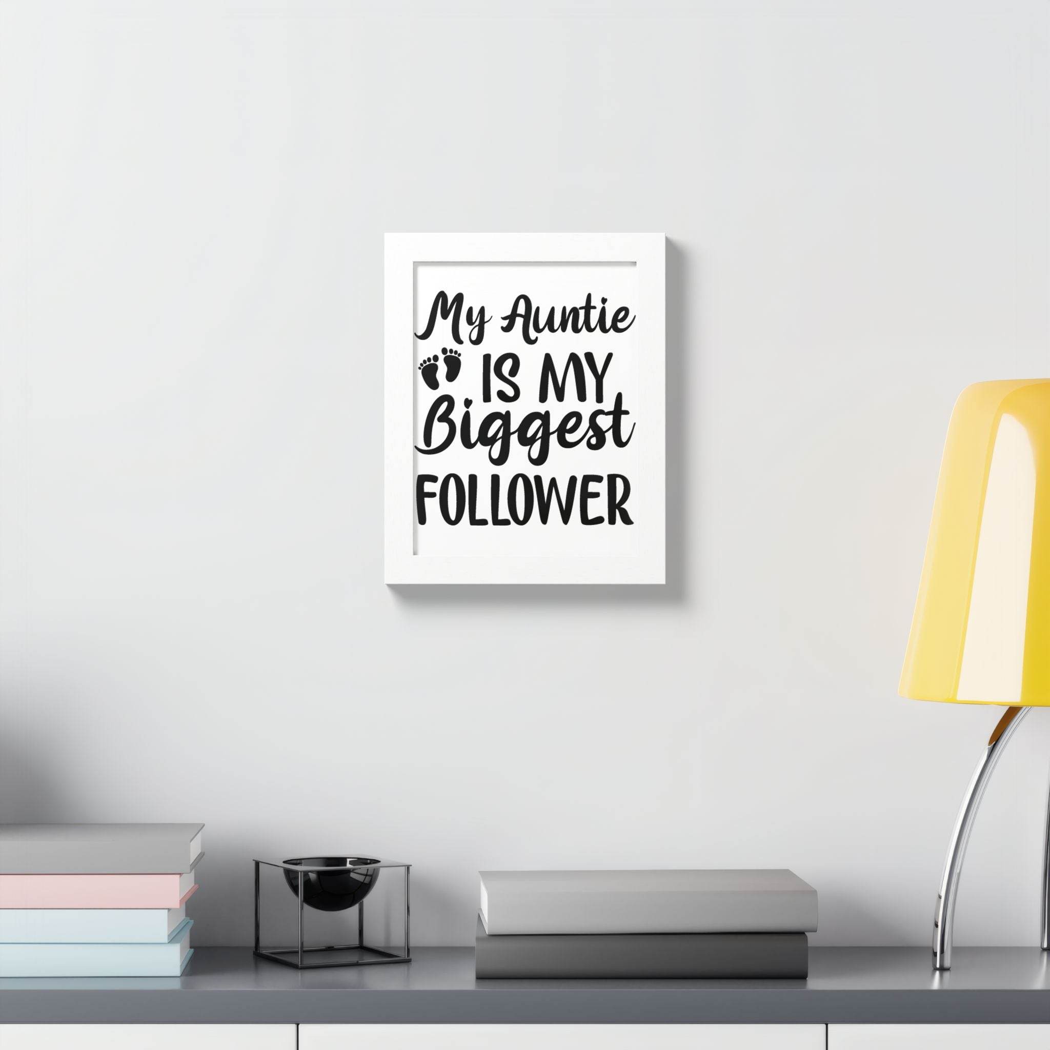 Eco-friendly framed poster by Printify with My Auntie is My Biggest Follower quote in black text