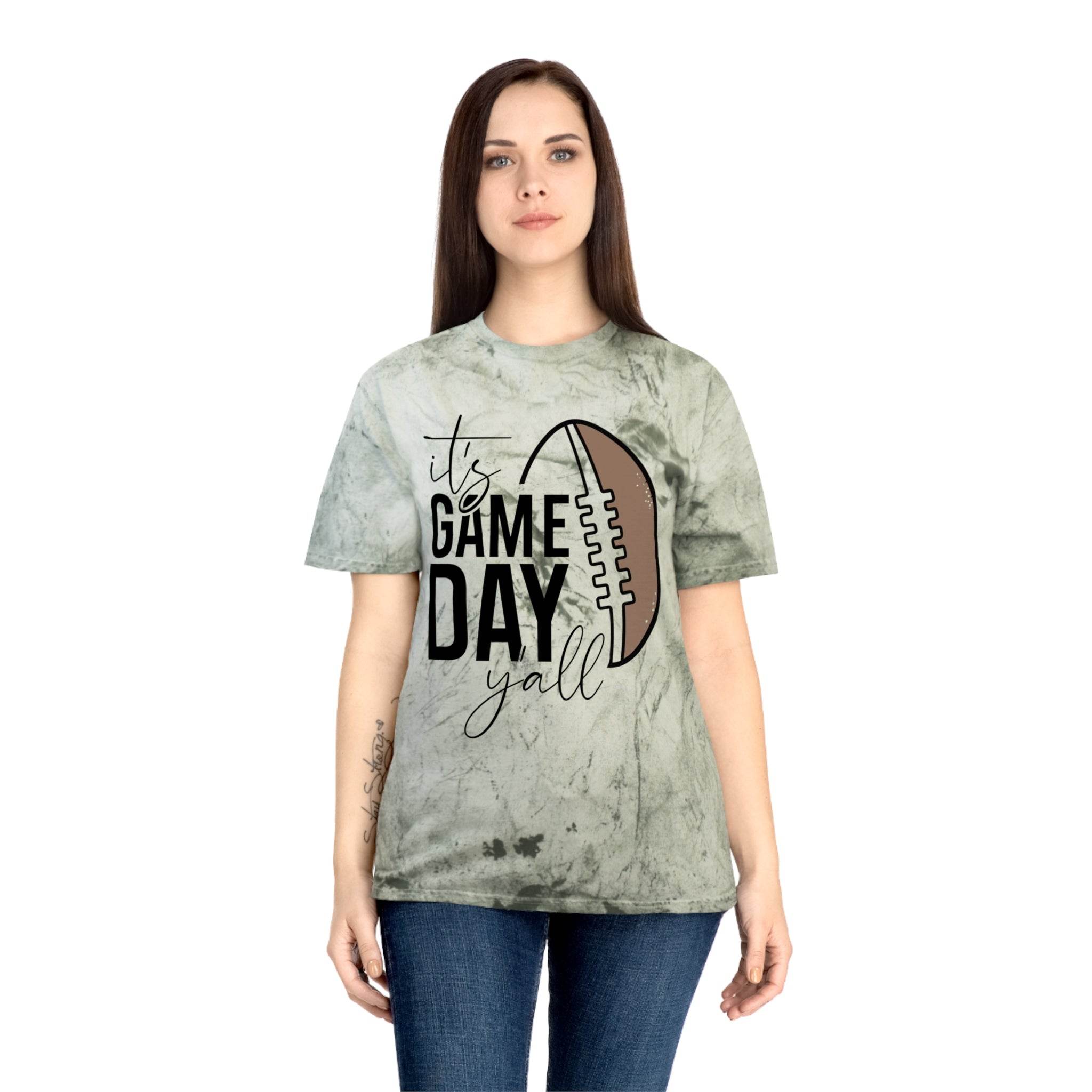 Eco-friendly game day t-shirt with football graphic and text on green tie-dye fabric