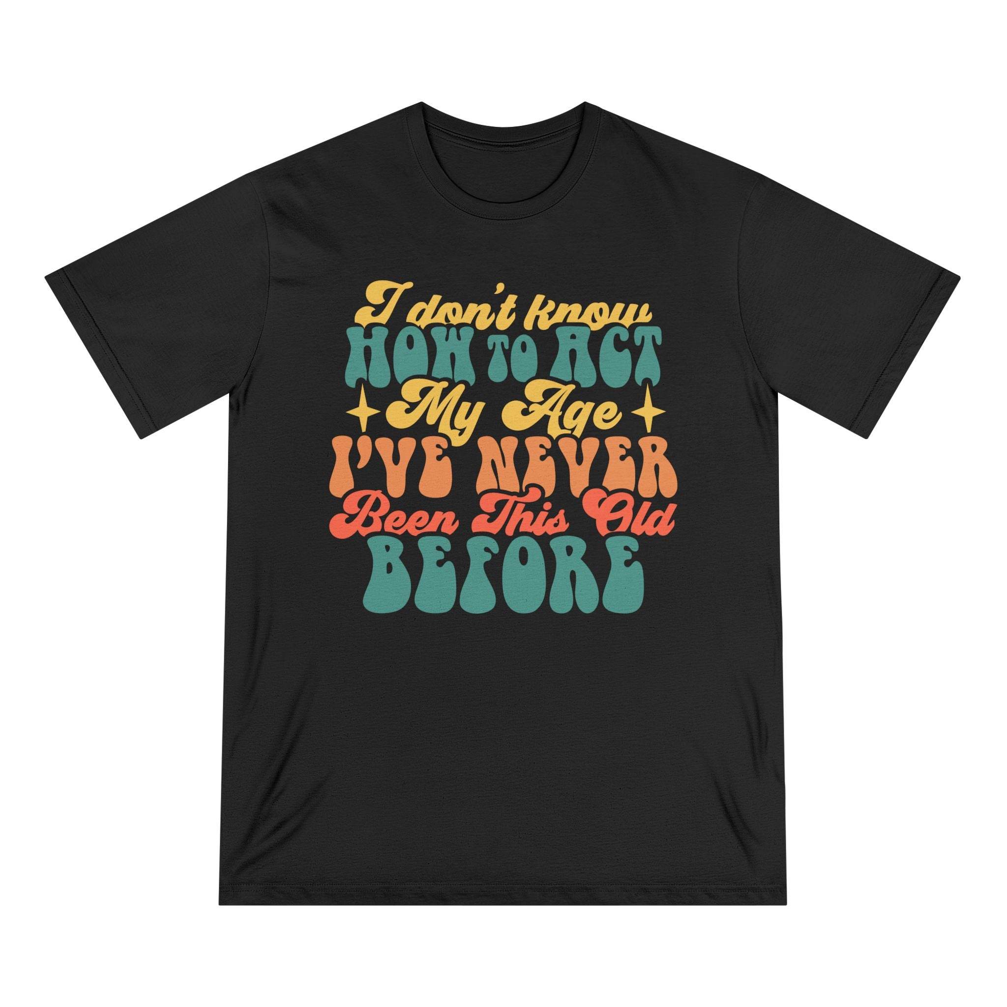 Printify black eco-friendly graphic tee with colorful vintage text design about age and acting