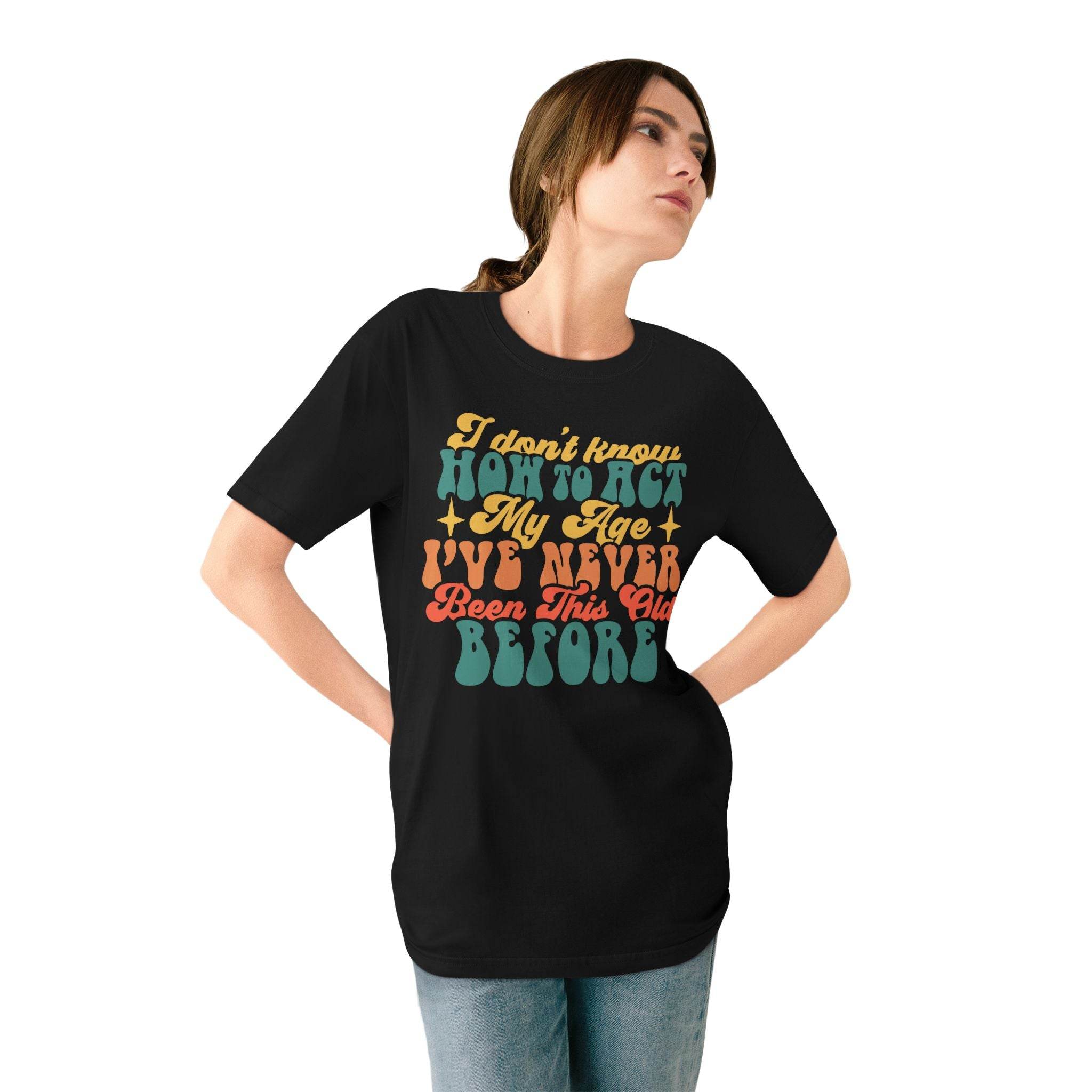 Black eco-friendly graphic tee from Printify with colorful vintage style text design