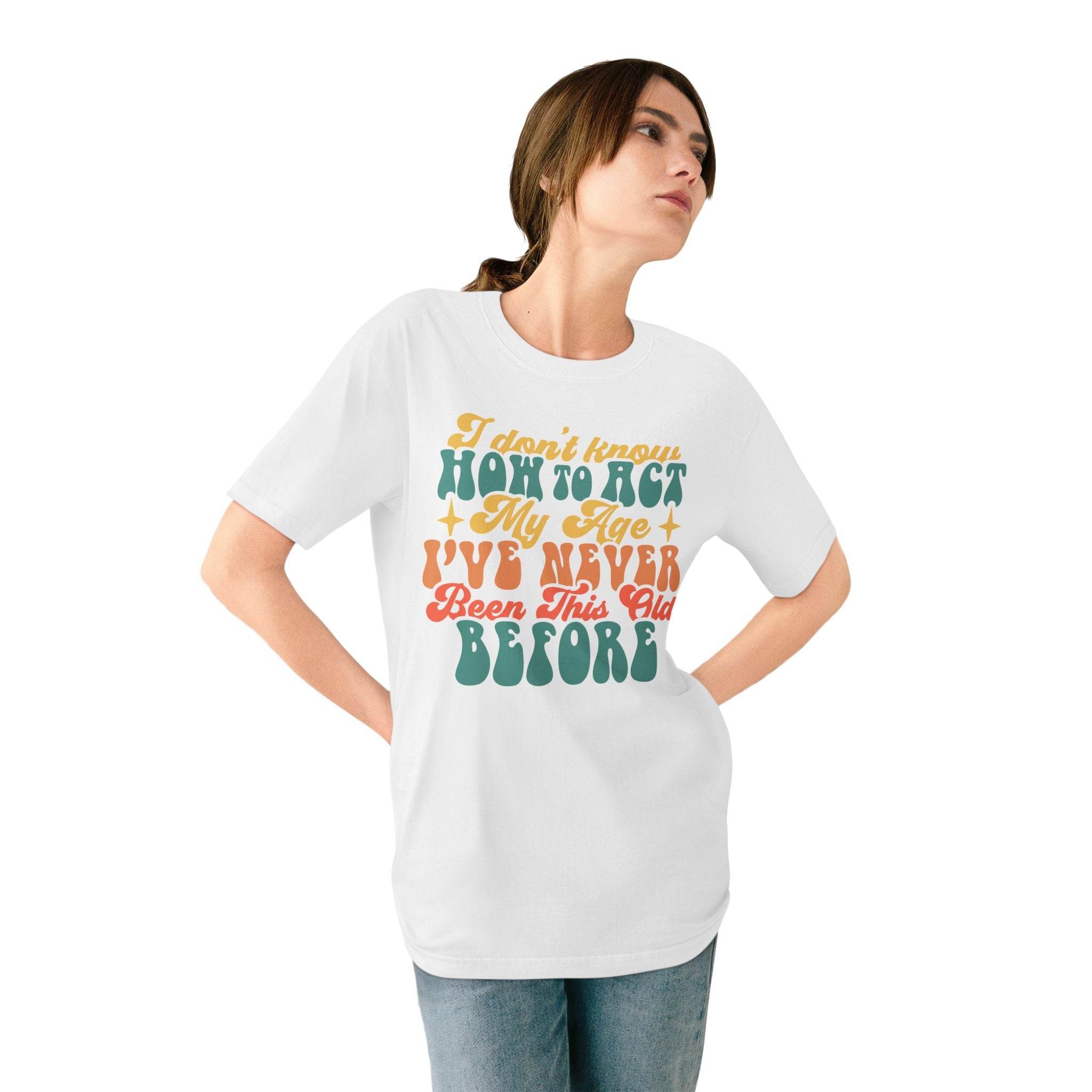 Printify white eco-friendly graphic tee with colorful vintage text design worn by woman
