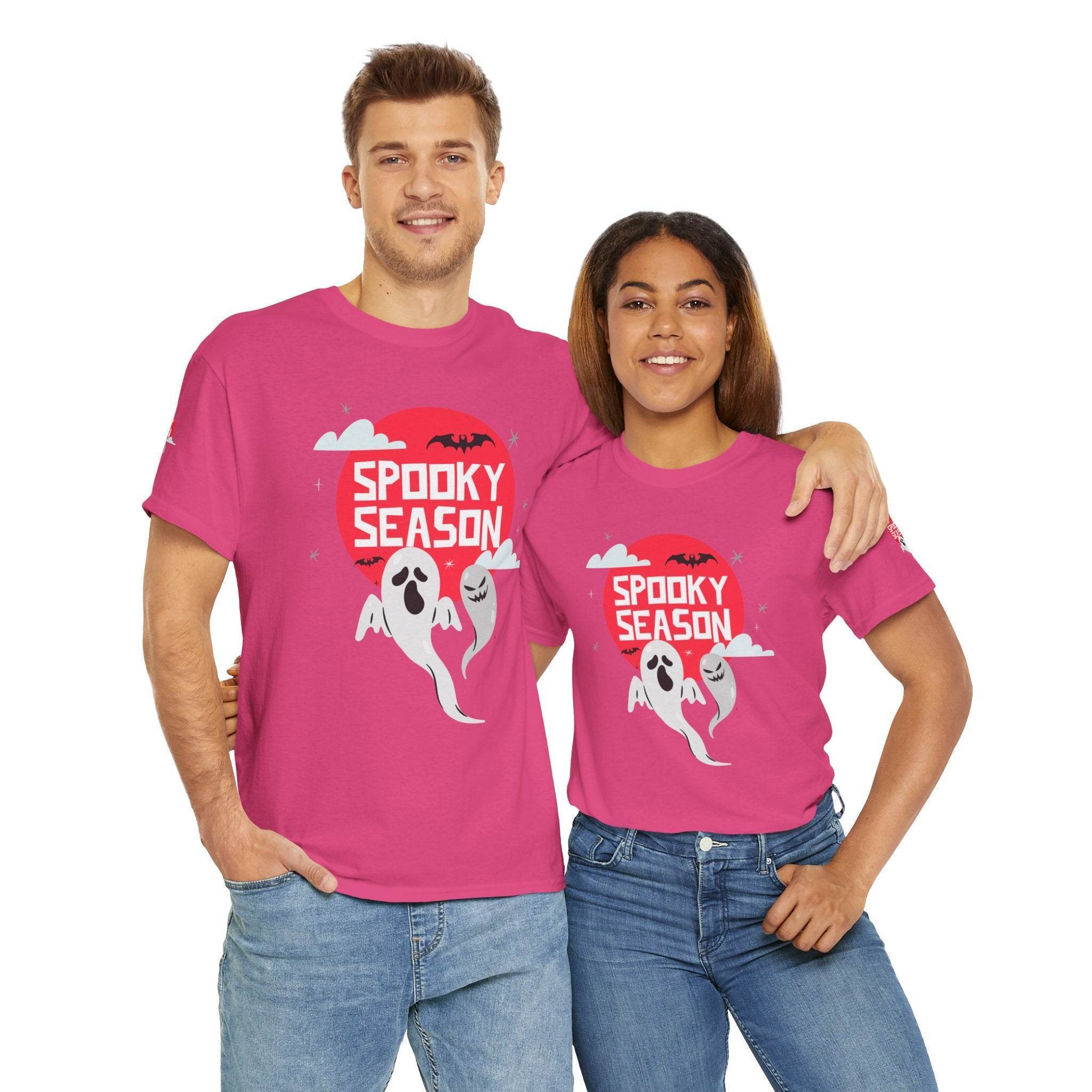 Printify eco-friendly Halloween shirt with spooky season ghost design worn by smiling man and woman