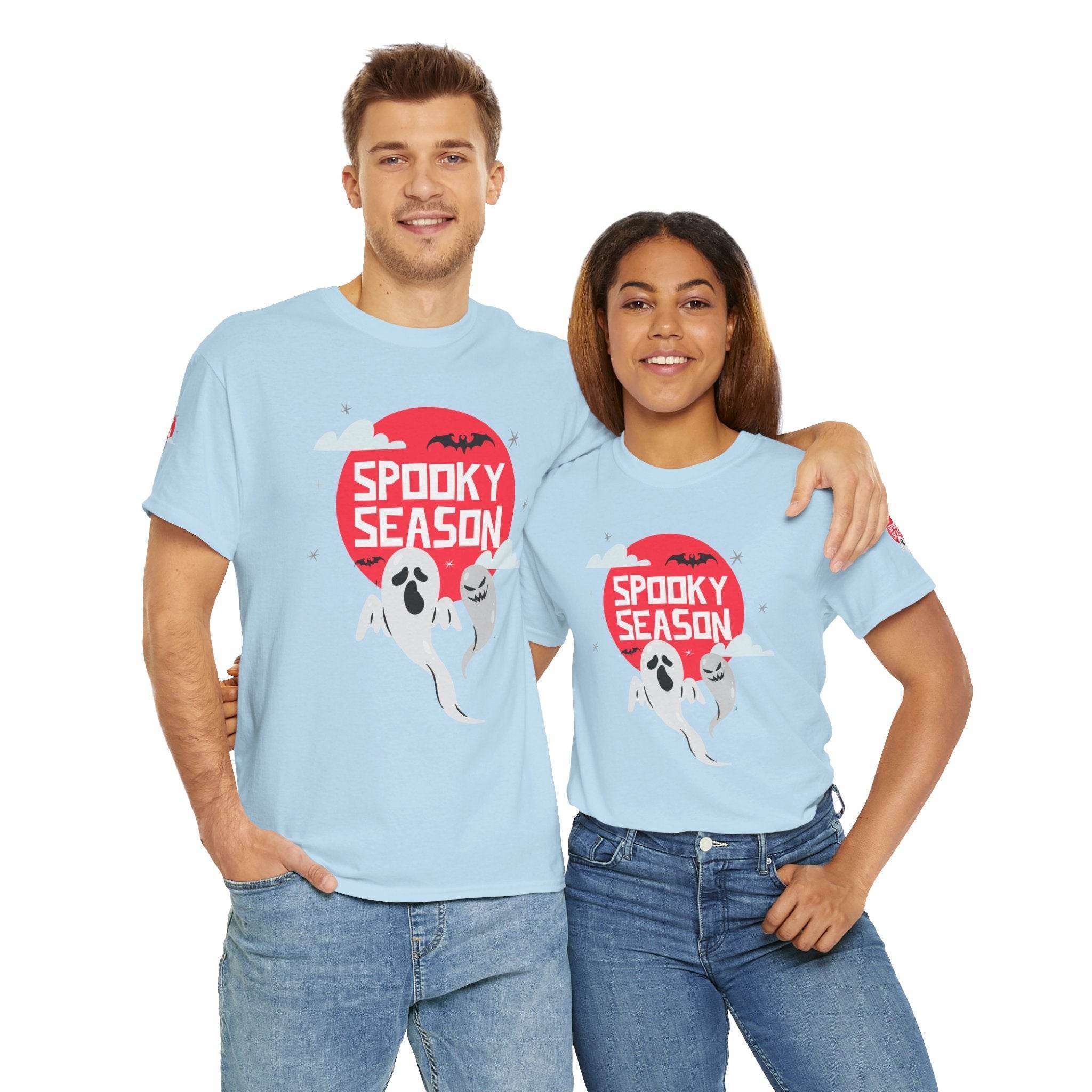 Printify eco-friendly Halloween shirt featuring spooky season ghost design on light blue T-shirts