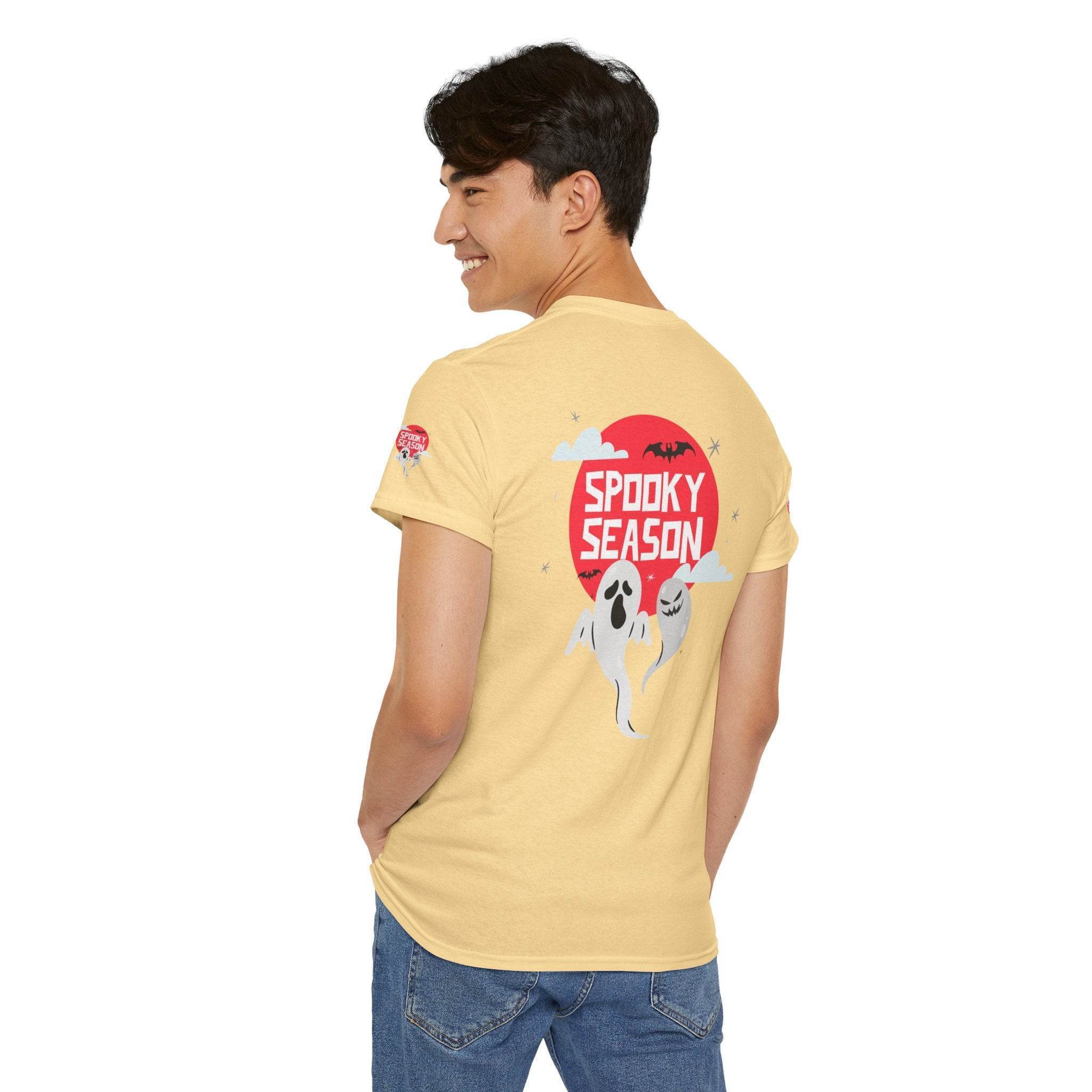 Printify eco-friendly Halloween shirt in light yellow with spooky season ghost and bat design