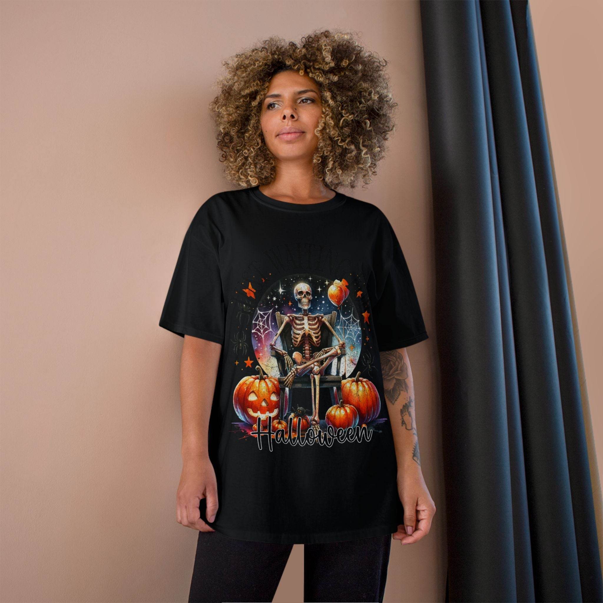 Black eco-friendly Halloween t-shirt featuring a skeleton with pumpkins and bats from Printify