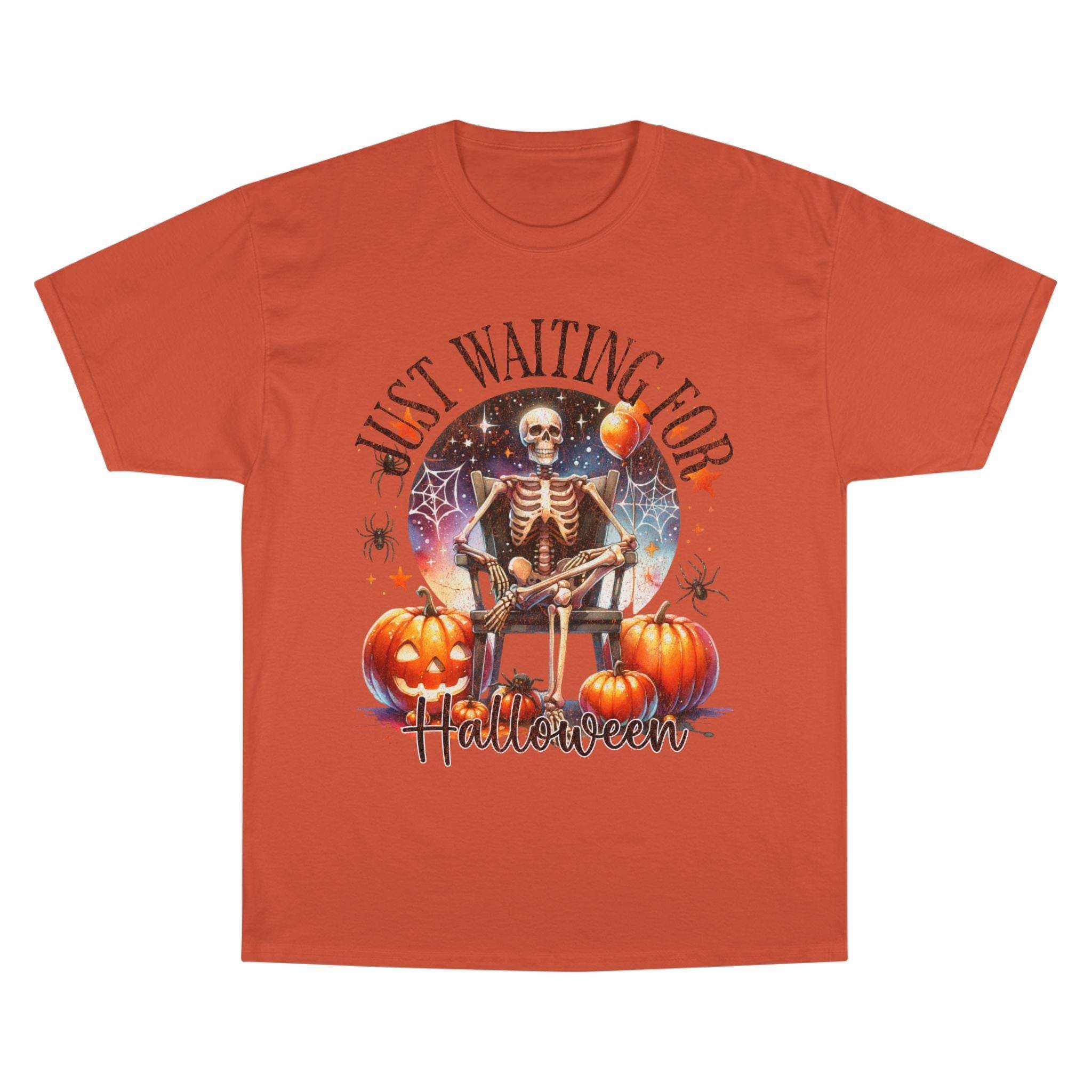 Printify eco-friendly Halloween t-shirt with skeleton, pumpkins, and spider web design in orange