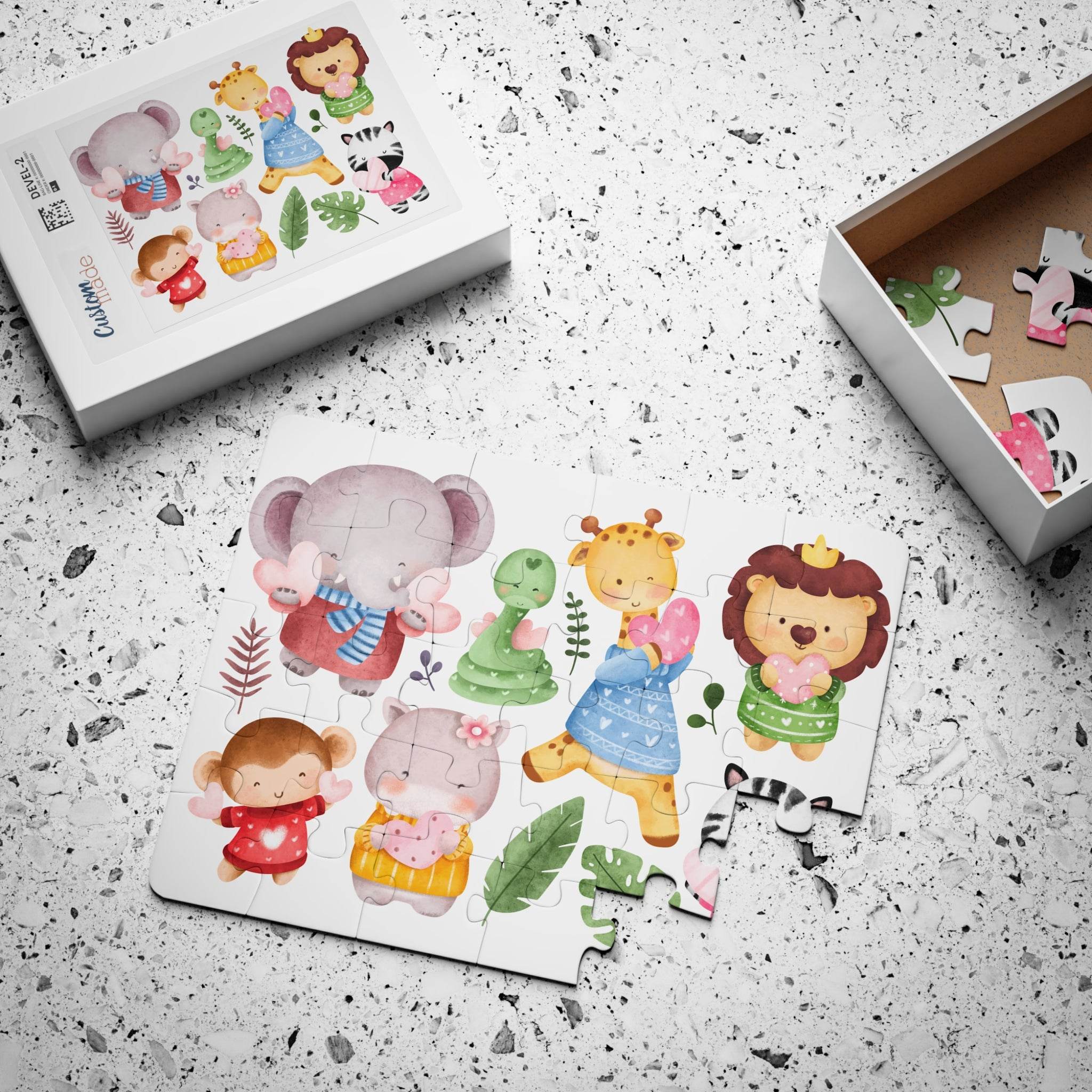 Printify eco-friendly kids puzzle featuring colorful animal characters including elephant, giraffe, lion, monkey, and zebra