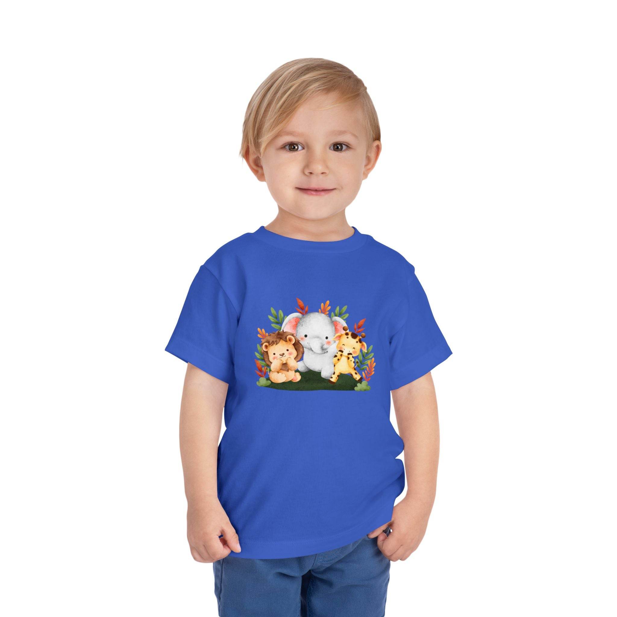 Printify eco-friendly kids t-shirt in blue with cute animal characters worn by a smiling young boy